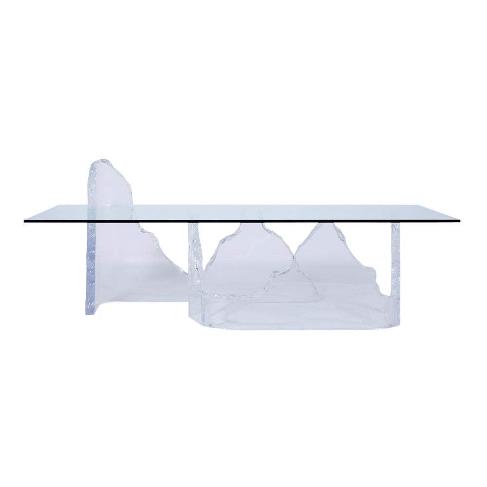 Unveiling an extraordinary Mid-Century-Style Lucite Cocktail Table, handcrafted with precision and style that has been newly restored by our team of expert craftsmen. This fabulous coffee table showcases a new rectangular tempered glass top with