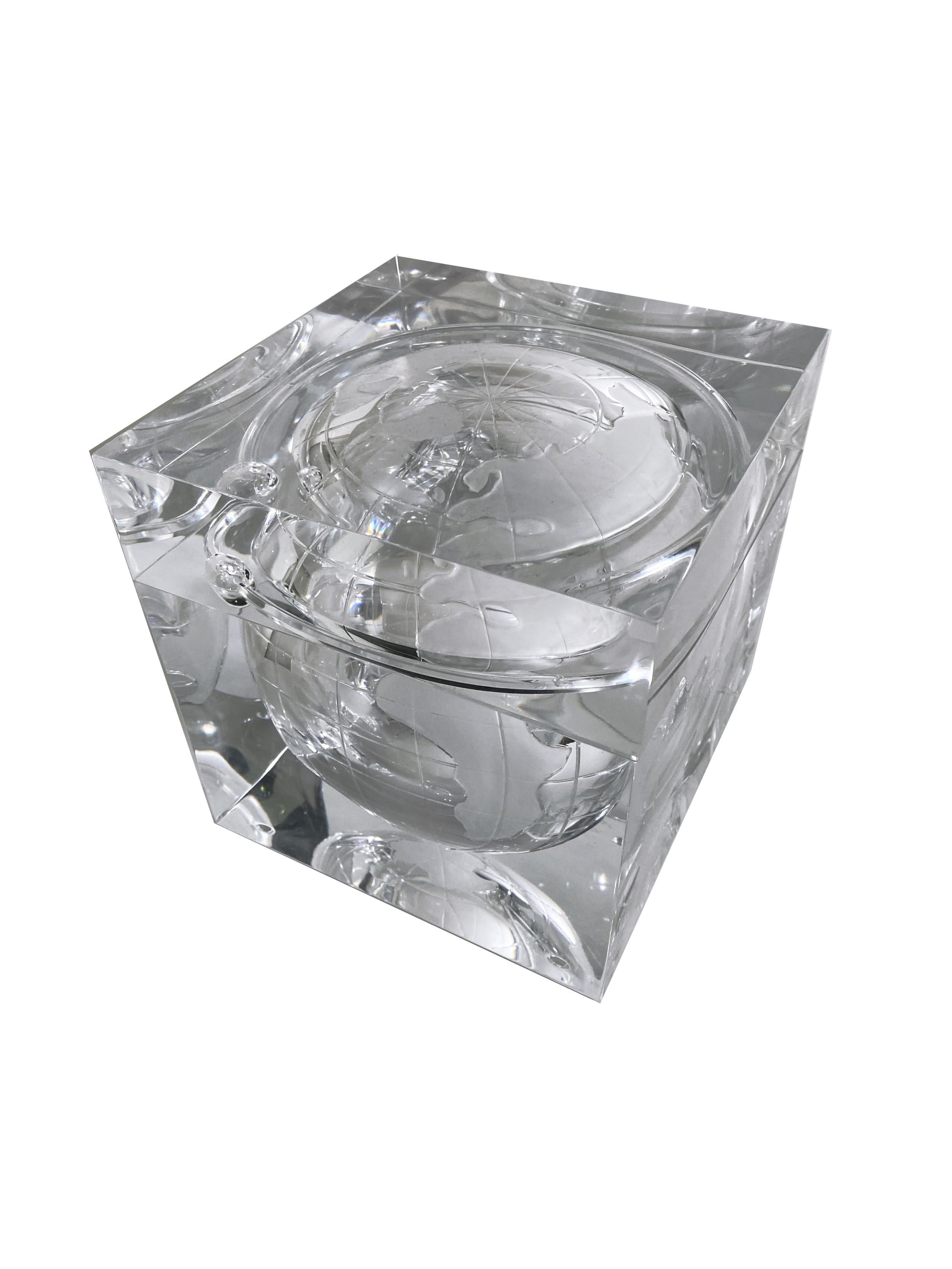 Mid-Century Modern (1960s-1970s) lucite ice bucket in cube form with an etched rounded interior design of the globe.(2 sections) (by ALESSANDRO ABRIZZI)
