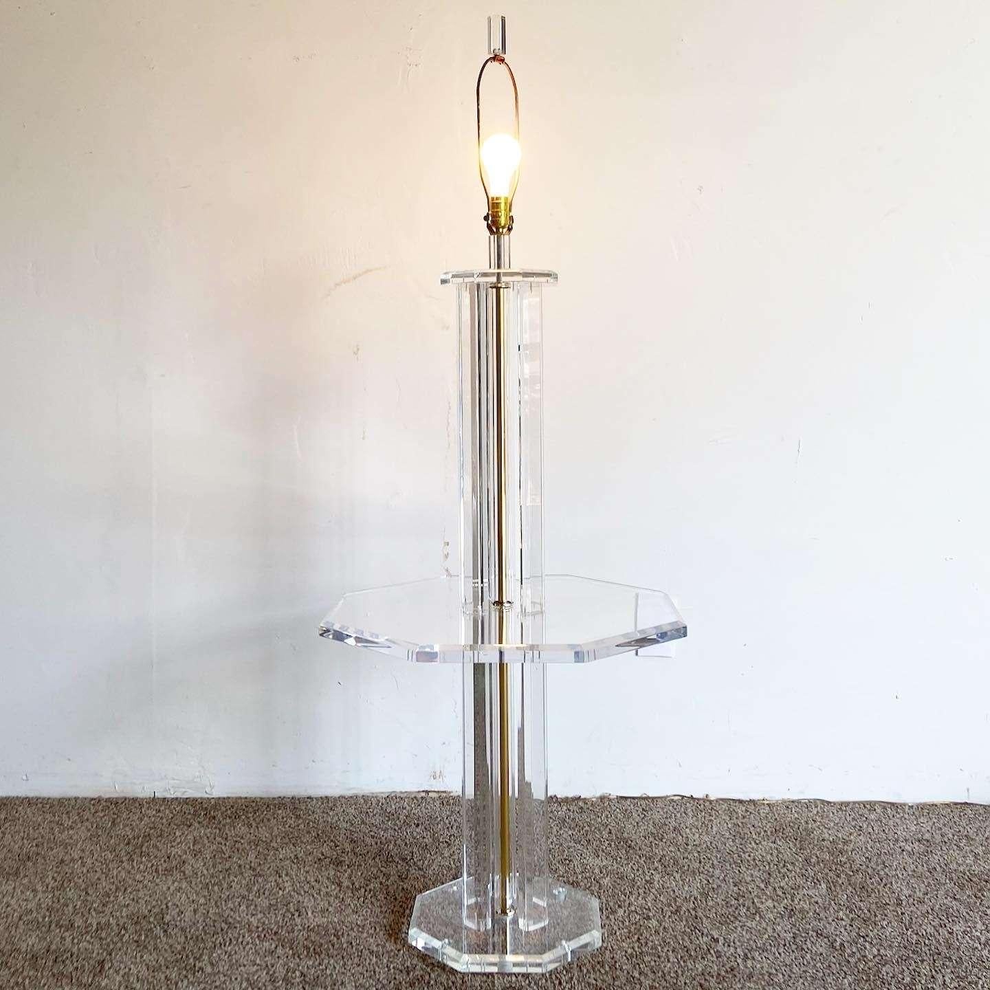 Amazing vintage mid century modern lucite floor lamp. Features an octagonal side table and a gold stem through the body of the lamp. 