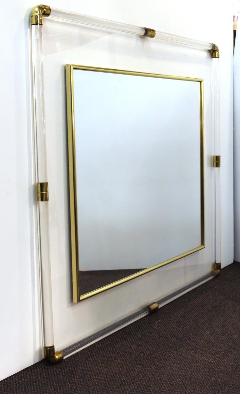 Mid-Century Modern Lucite Framed Mirror with Brass Accents at 1stDibs