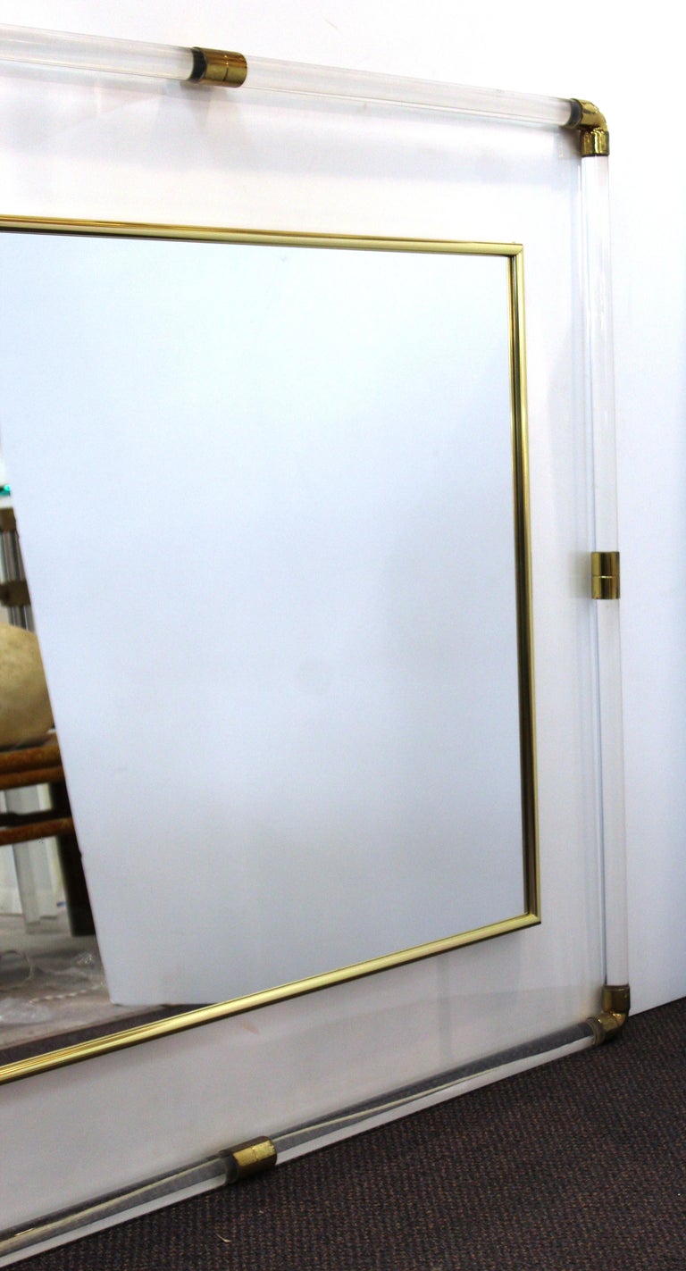 Mid-Century Modern Lucite Framed Mirror with Brass Accents at 1stDibs