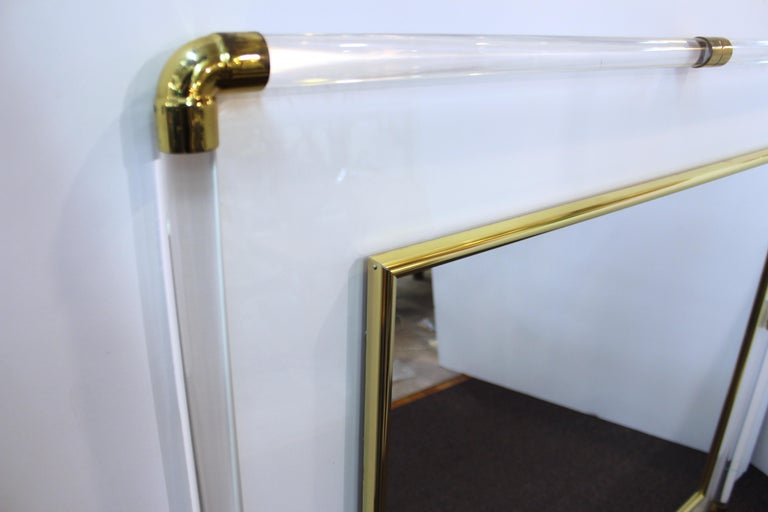 Mid-Century Modern Lucite Framed Mirror with Brass Accents at 1stDibs