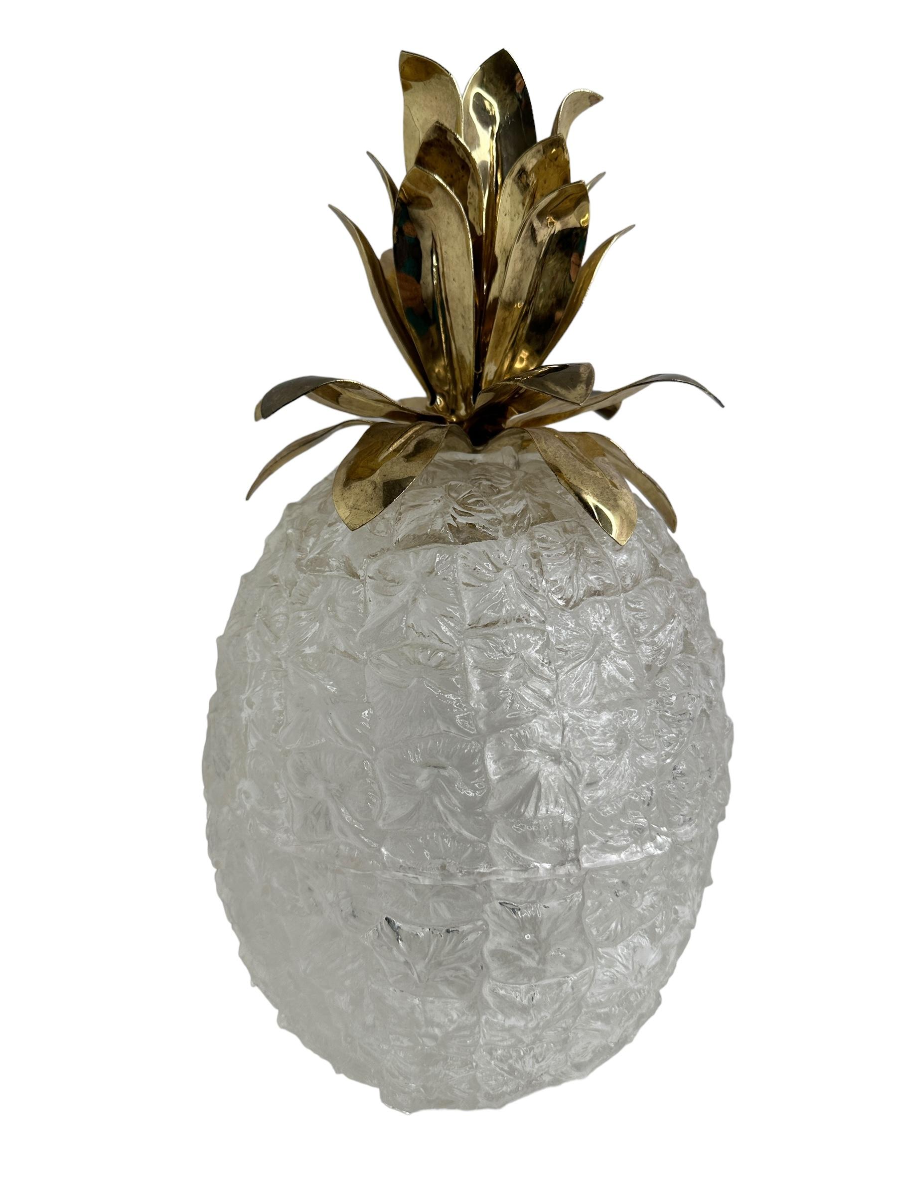 A nice barware item, made in the1970s. An all original Lucite and gold plated metal item to display in your bar or just on a cupboard for your ice cubes. Lucite or acrylic glass, in the shape of a pineapple. Found at an Estate Sale in Nuremberg,