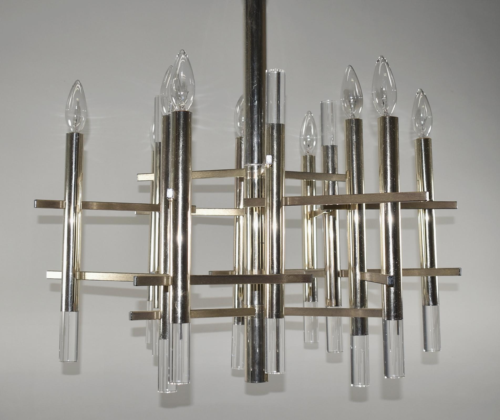 Mid-Century Modern Lucite and silver overlay 9 socket chandelier by Sciolari. Dimensions: 22