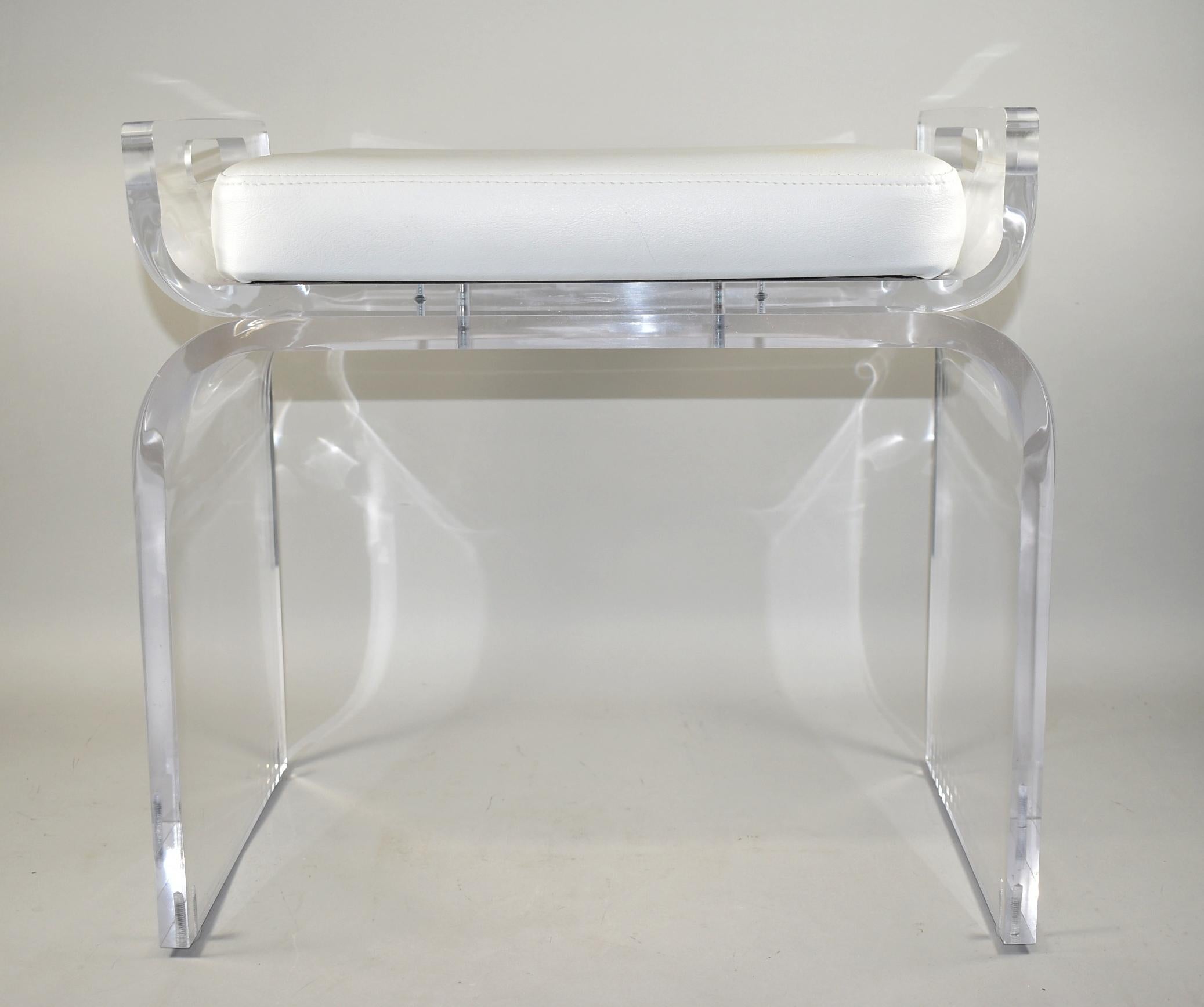 Mid-Century Modern Lucite stool seat with a Naugahyde cushion.