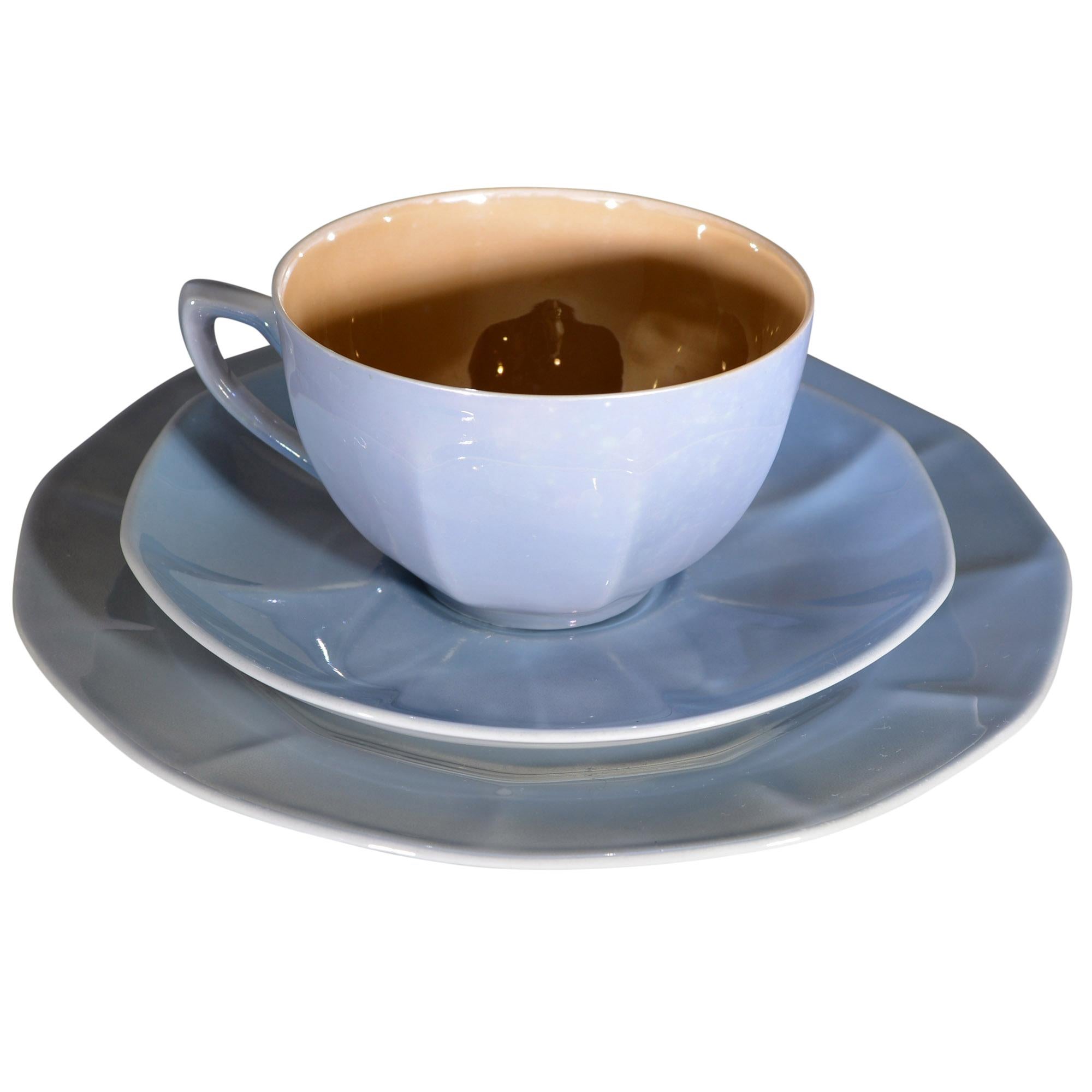 Set include teapot, creamer, sugar bowl and two cups with underplates and small plates. The pale blue exterior color is offset perfectly with the gold interior. Kettle and creamer have numbers in their molds. The set is Victoria