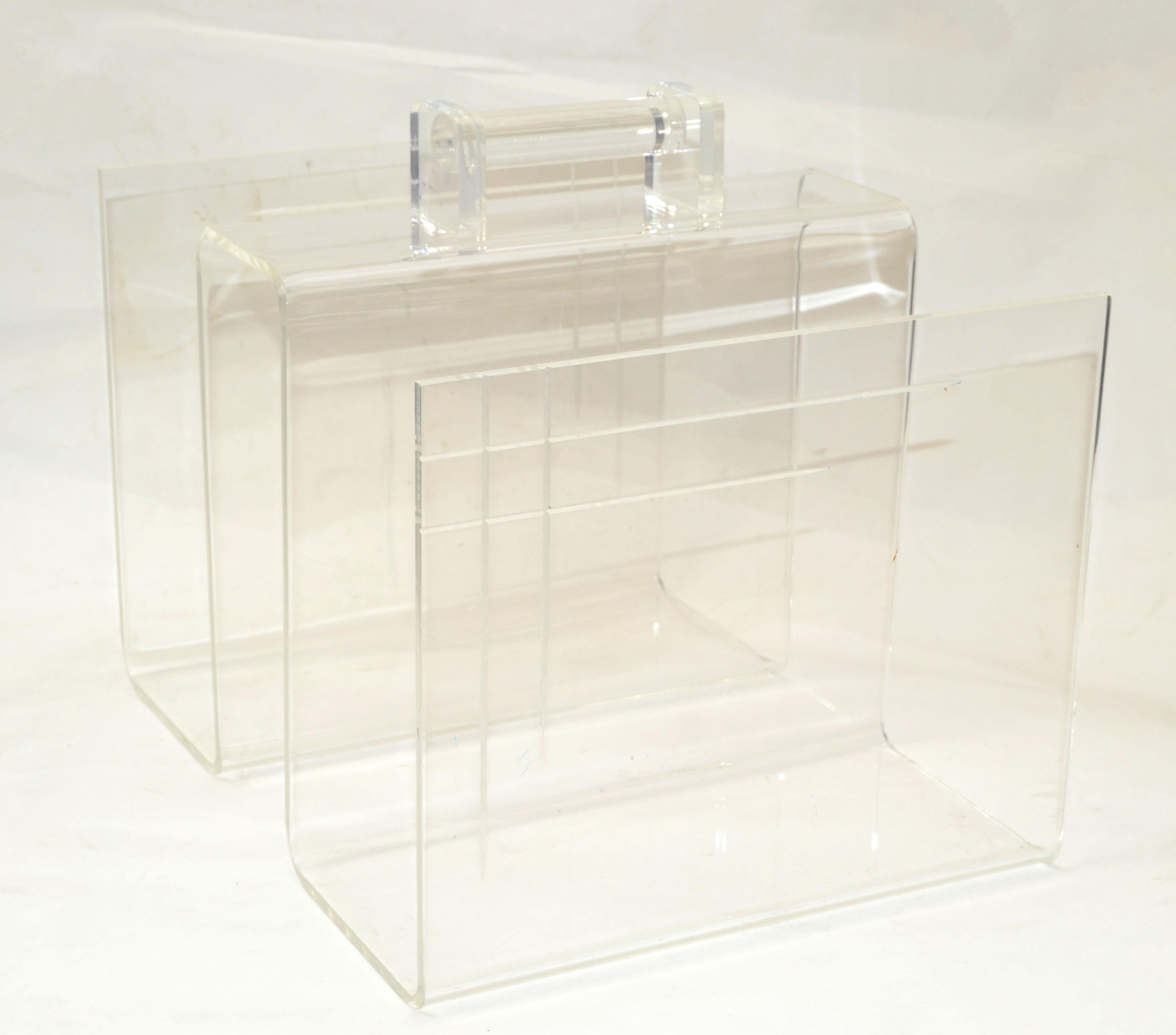Mid-Century Modern magazine rack, Newspaper Stand in Lucite with etched details to the sides.
Beautiful piece for any interior design to store your favorite magazines or books.