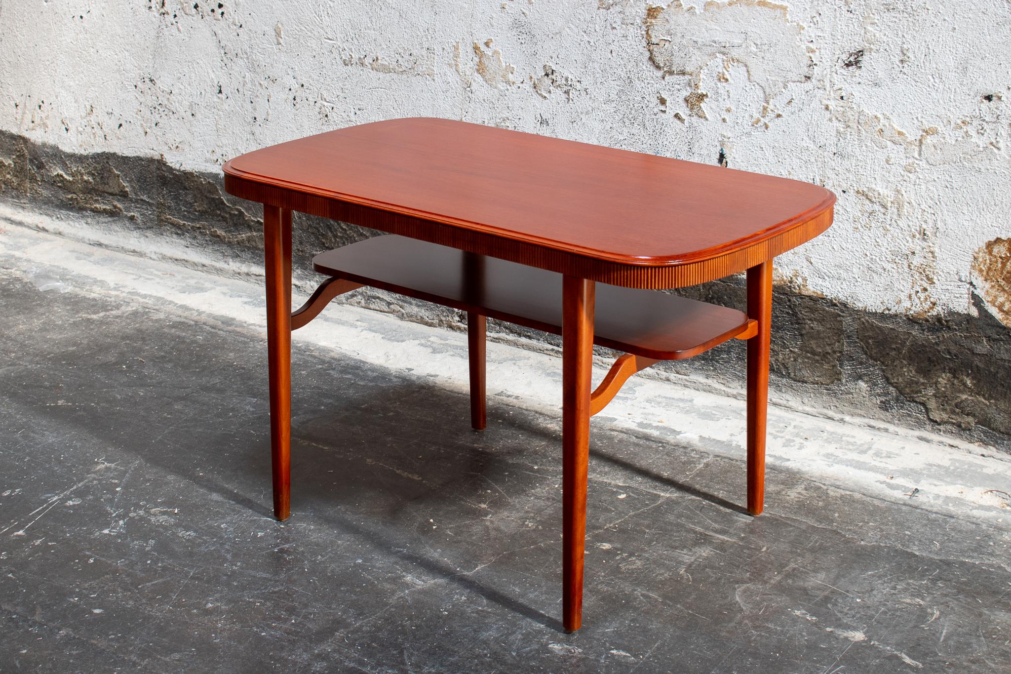 Swedish Mid Century Modern end or side table made of mahogany. Known in Sweden as 