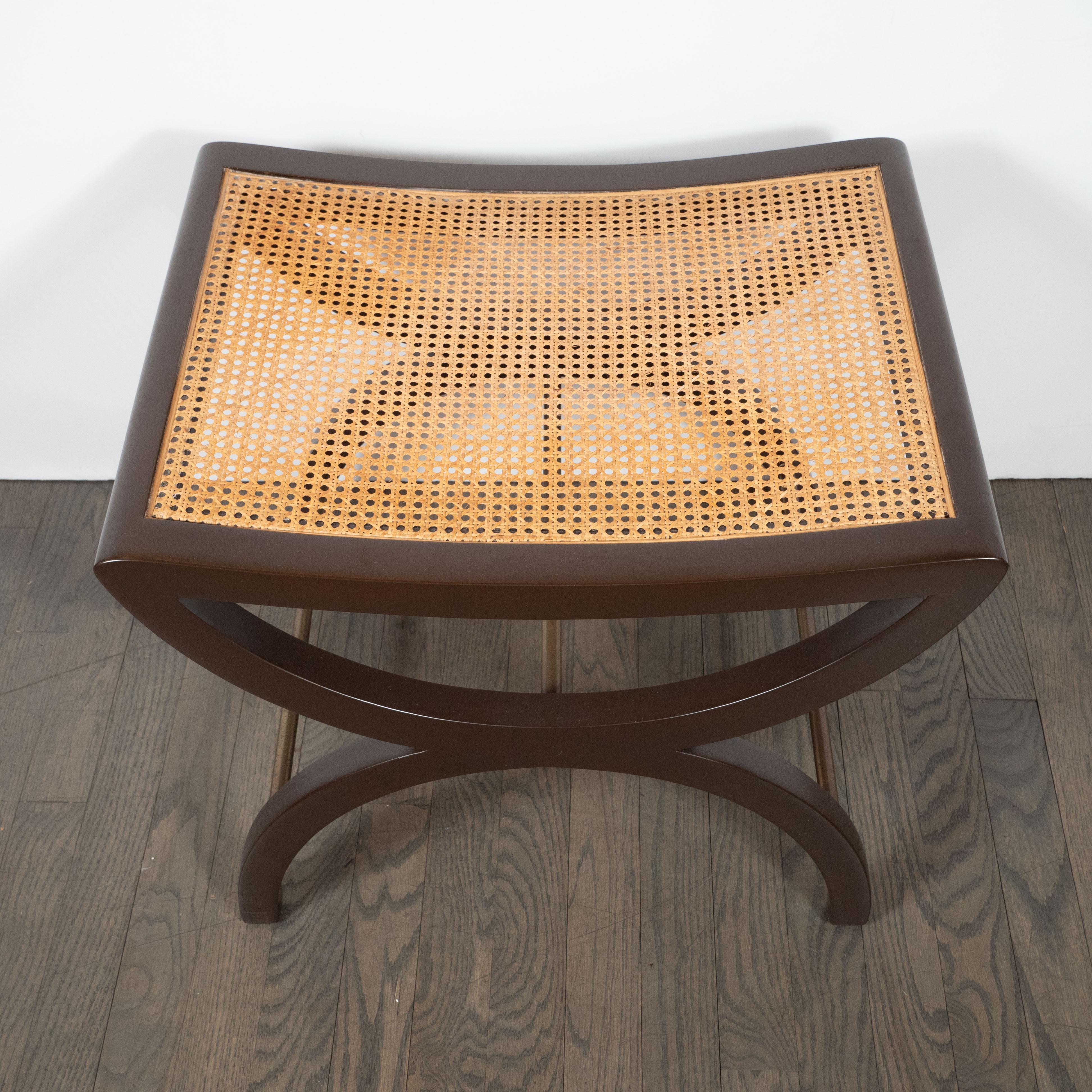 This elegant stool was designed by Edward Wormley for the Dunbar Furniture Company, circa 1960. Wormley, celebrated for the refined materiality and meticulous craftsmanship of his design pieces, created works that were thoroughly modern but often