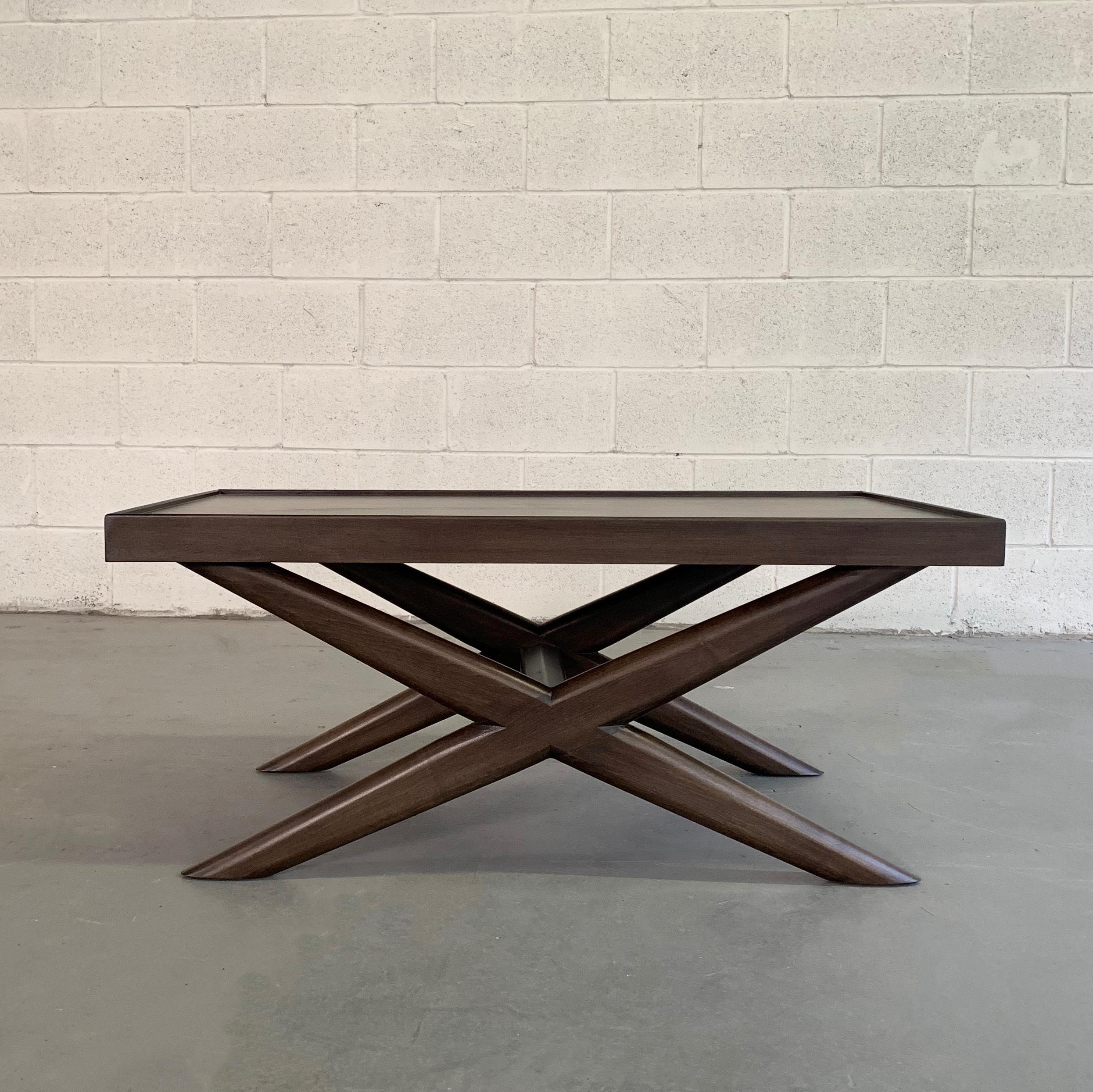 Beautifully proportioned, Mid-Century Modern, mahogany coffee table features a sculpted X-base with recessed top.