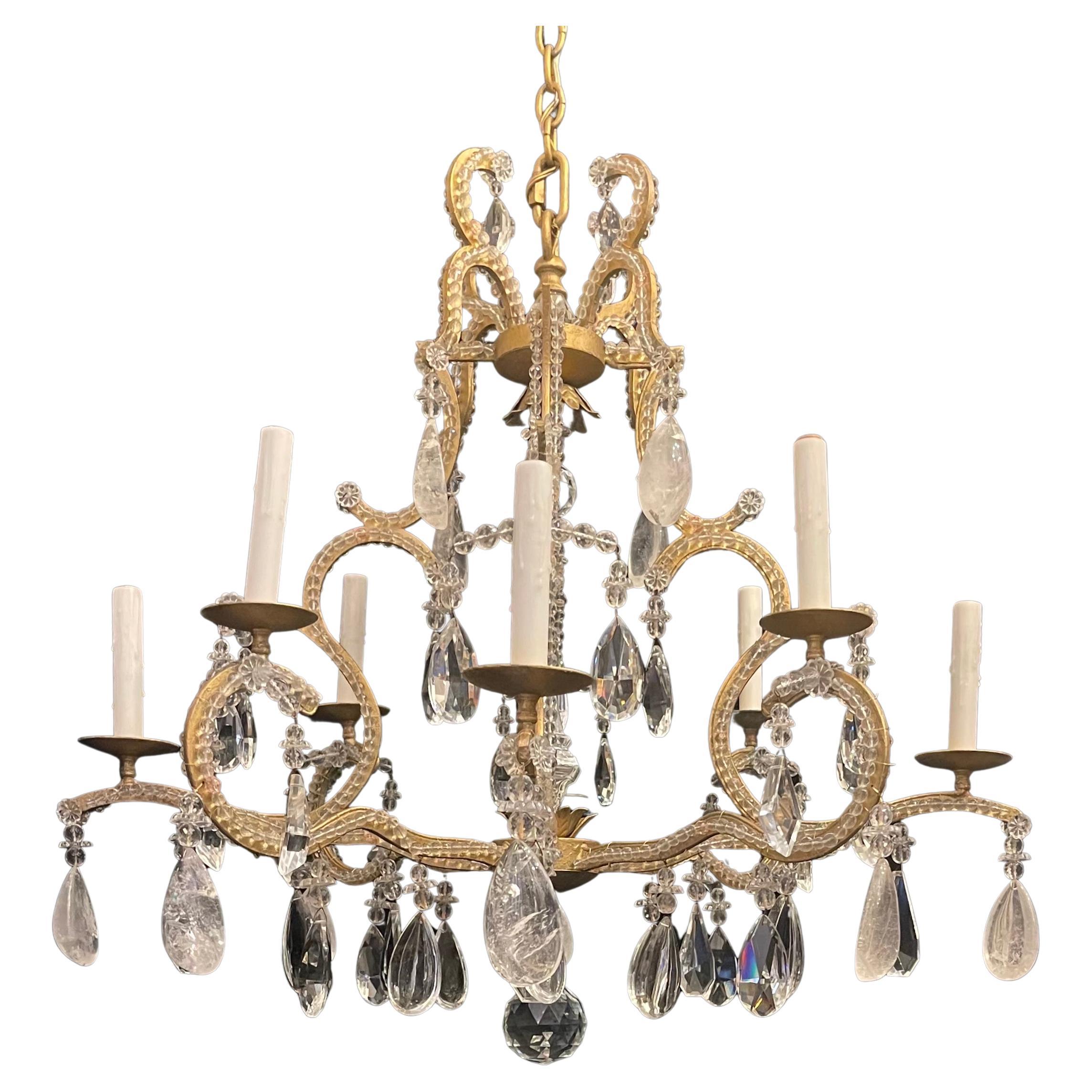A Wonderful Mid-Century Modern Maison Baguès Style Gold Gilt With Beaded Arms And Flowers Leading To Rock Crystal Drops Large 8 Candelabra Light Chandelier.