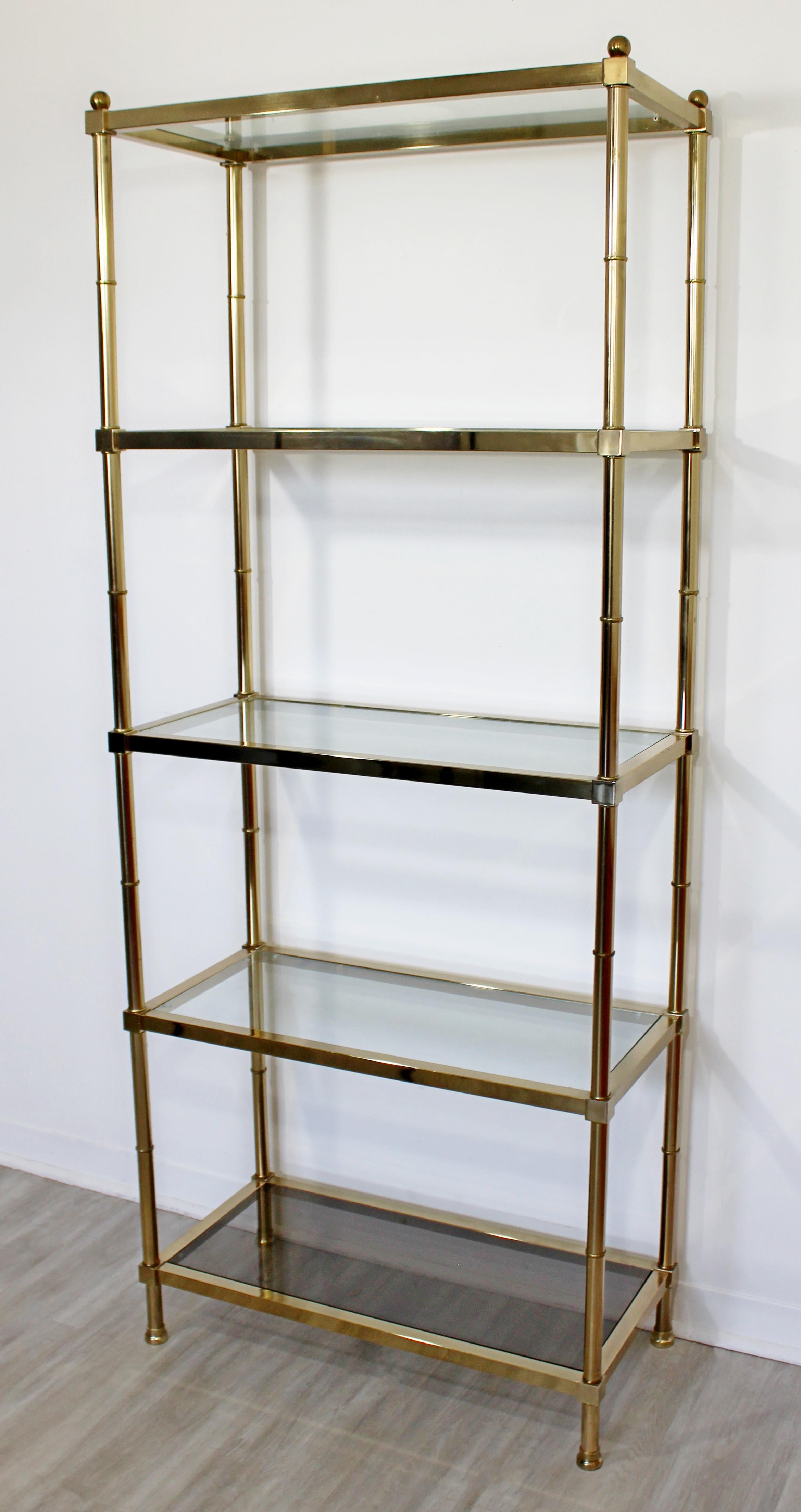 brass and glass shelving