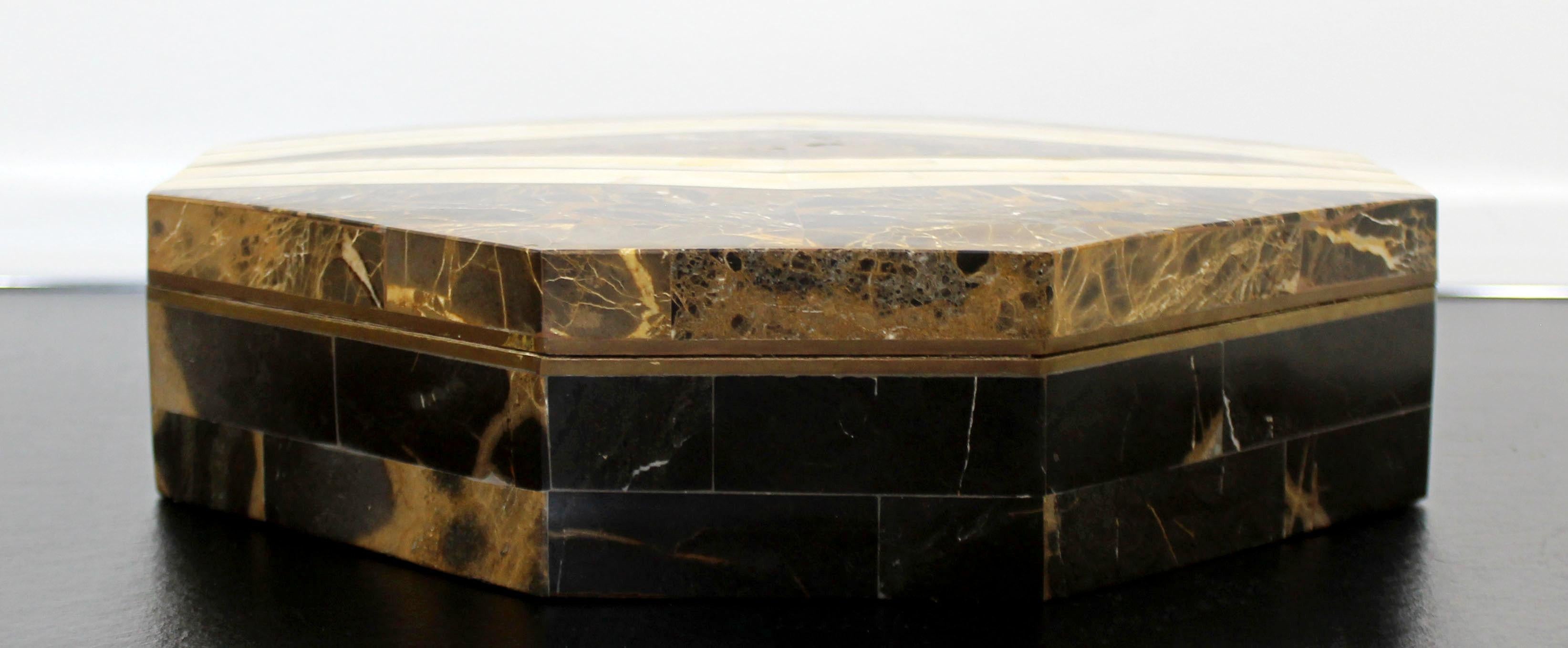 For your consideration is a fantastic lidded box, made of brass and tessellated stone over wood, by Robert Marcius for Casa Bique, circa 1970s. In excellent condition. The dimensions are 13