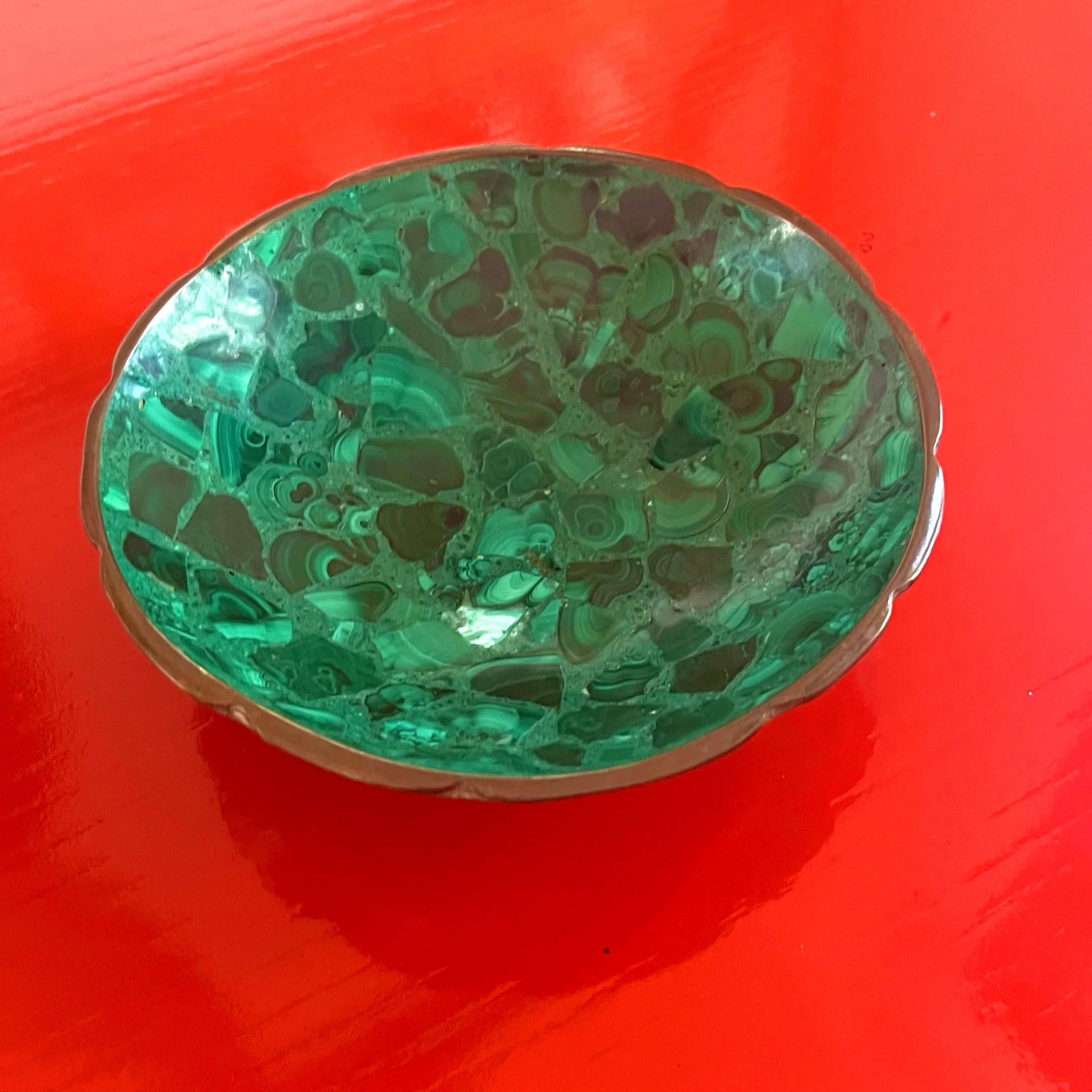 A stunning mid-century modern authentic malachite bowl with a brass scalloped rim.  The details in this piece are fantastic.  Great decorative bowl or catchall.