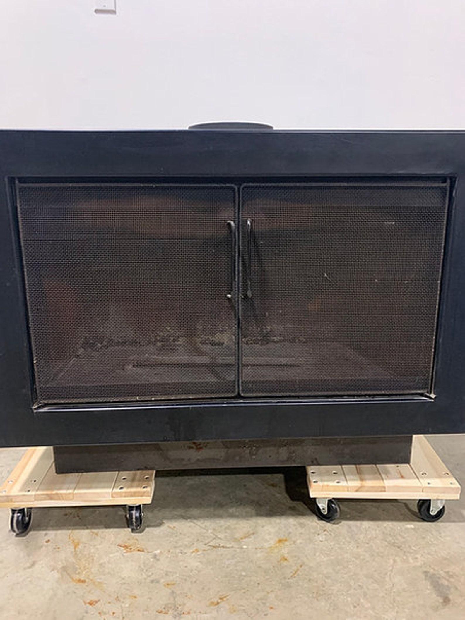 Make a big impression with this large but minimalist vintage mid-century modern fireplace. this is the Manchester Pierce model (MPX 103) that was a high-end option in the early 70s. It features twin-wall construction, optional gas hookup, and