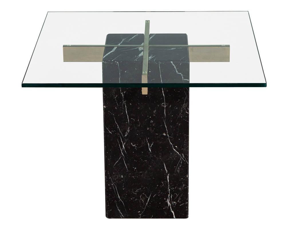 Mid-Century Modern marble brass & glass side table by Artedi. Black marble with white veining, glass and brass end table in original condition. Featuring new glass top.

Price includes complimentary curb side delivery to the continental USA.