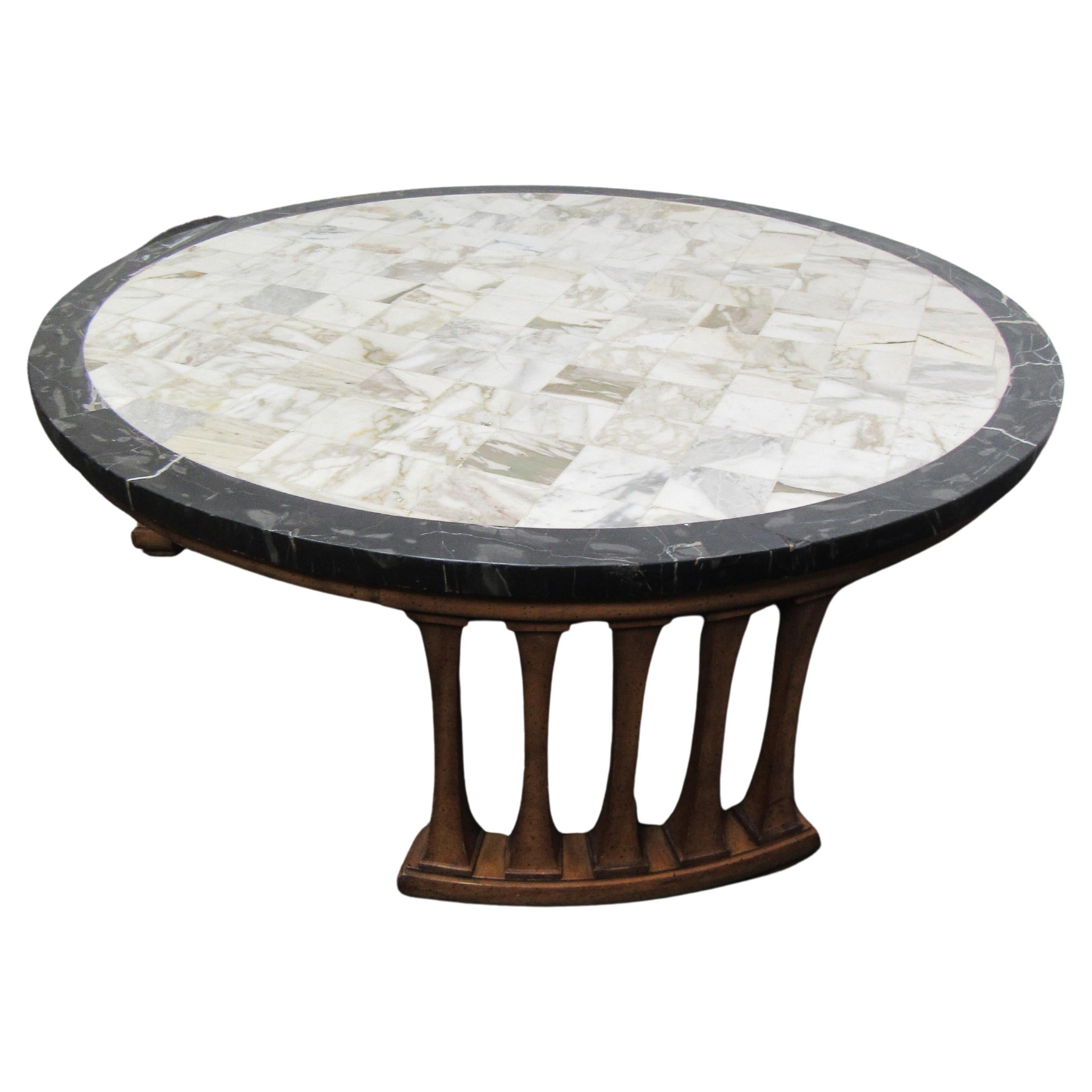 Interesting marble coffee table. Wooden legs with a travertine top.
(Please confirm item location - NY or NJ - with dealer).
   