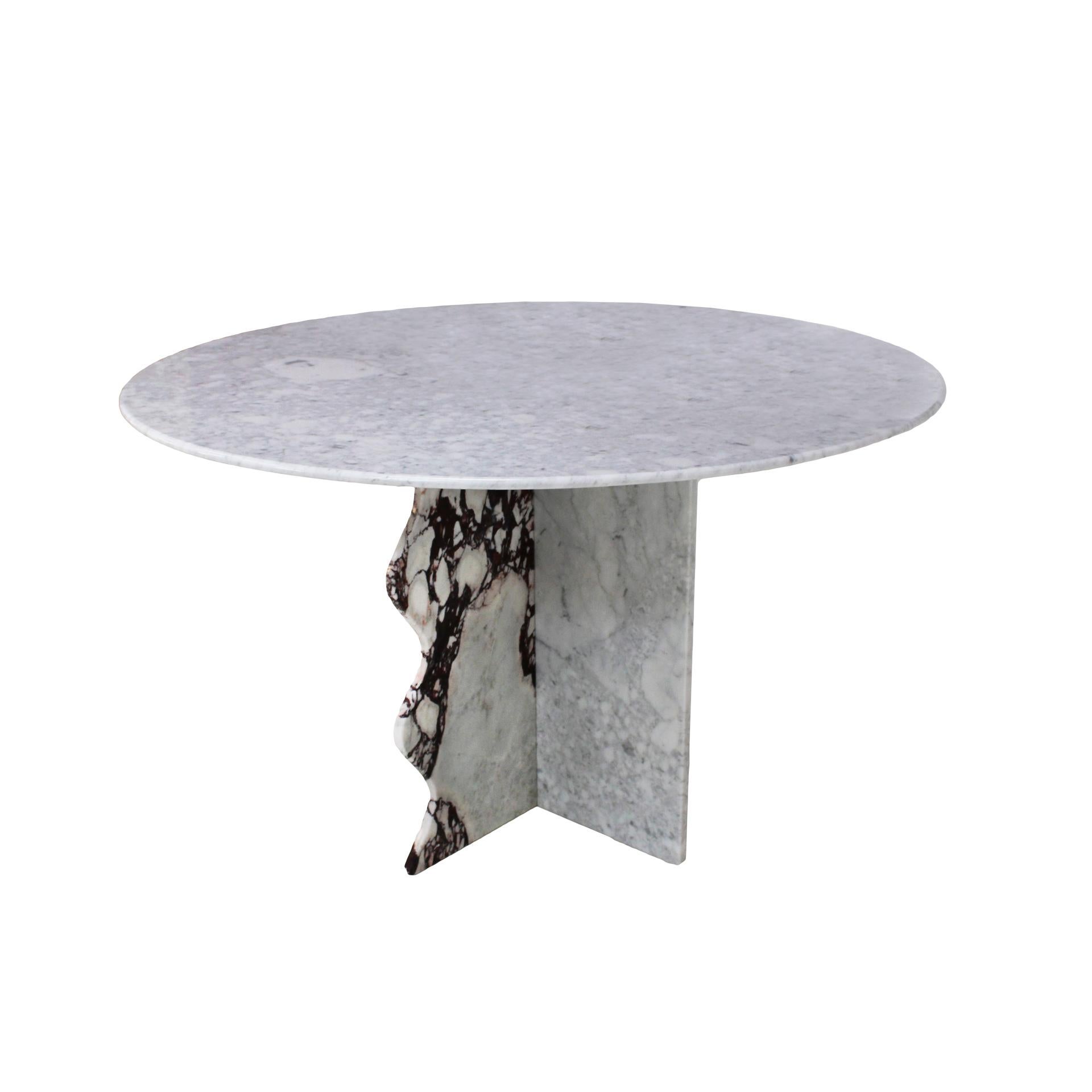 Circular table designed and produced by L.A. Studio. Made of Carrara ans Arabescato marble. 

Our main target is customer satisfaction, so we include in the price for this item professional and custom made packing.

Every item LA Studio offers is
