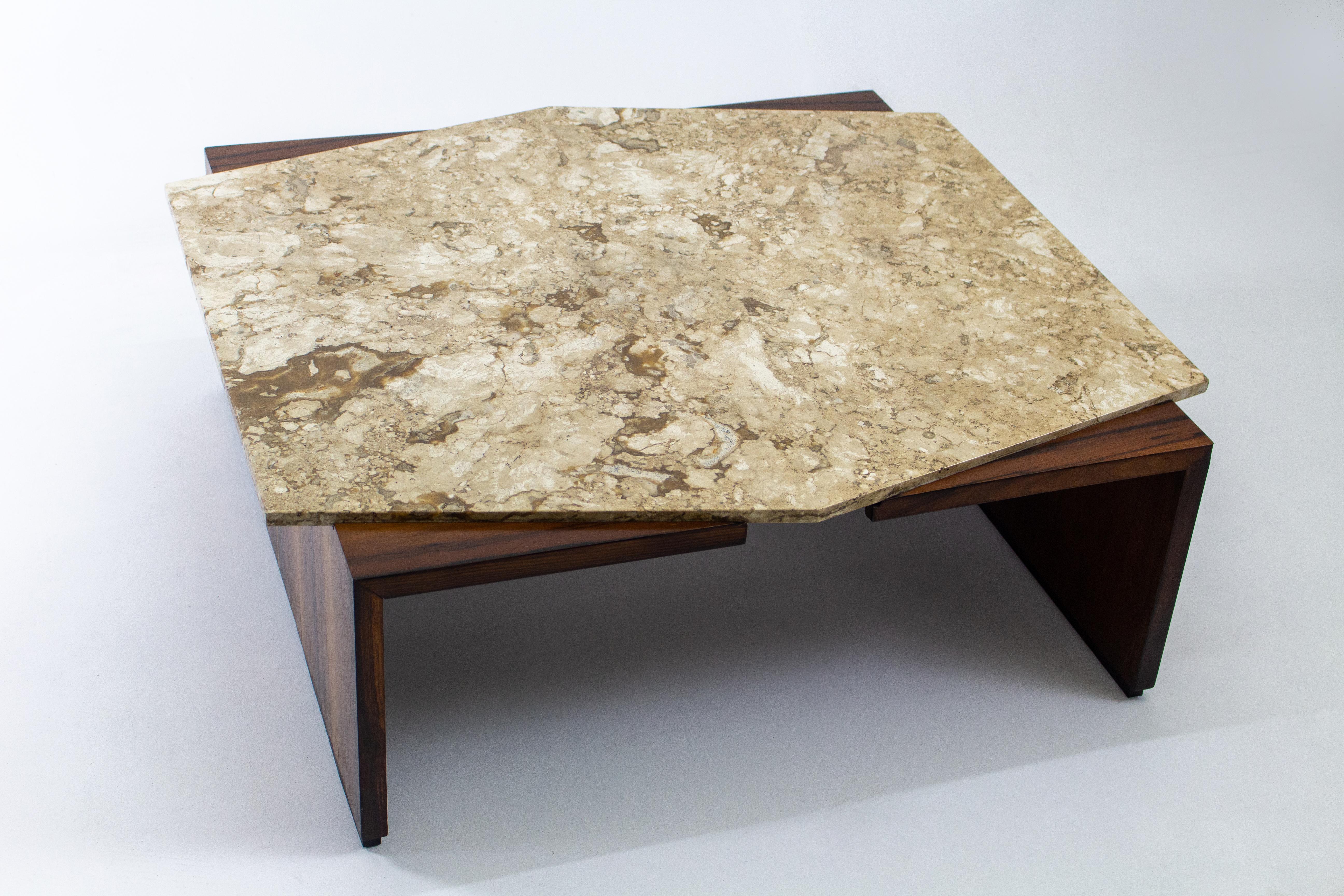 Mid-Century Modern marble top center table by Forma Manufacture, Brazil 1950s.

Singular 1950s center table by the Brazilian manufacture Forma. Structured with plywood veneered with highly figured wood and solid wood, this piece features a nestled