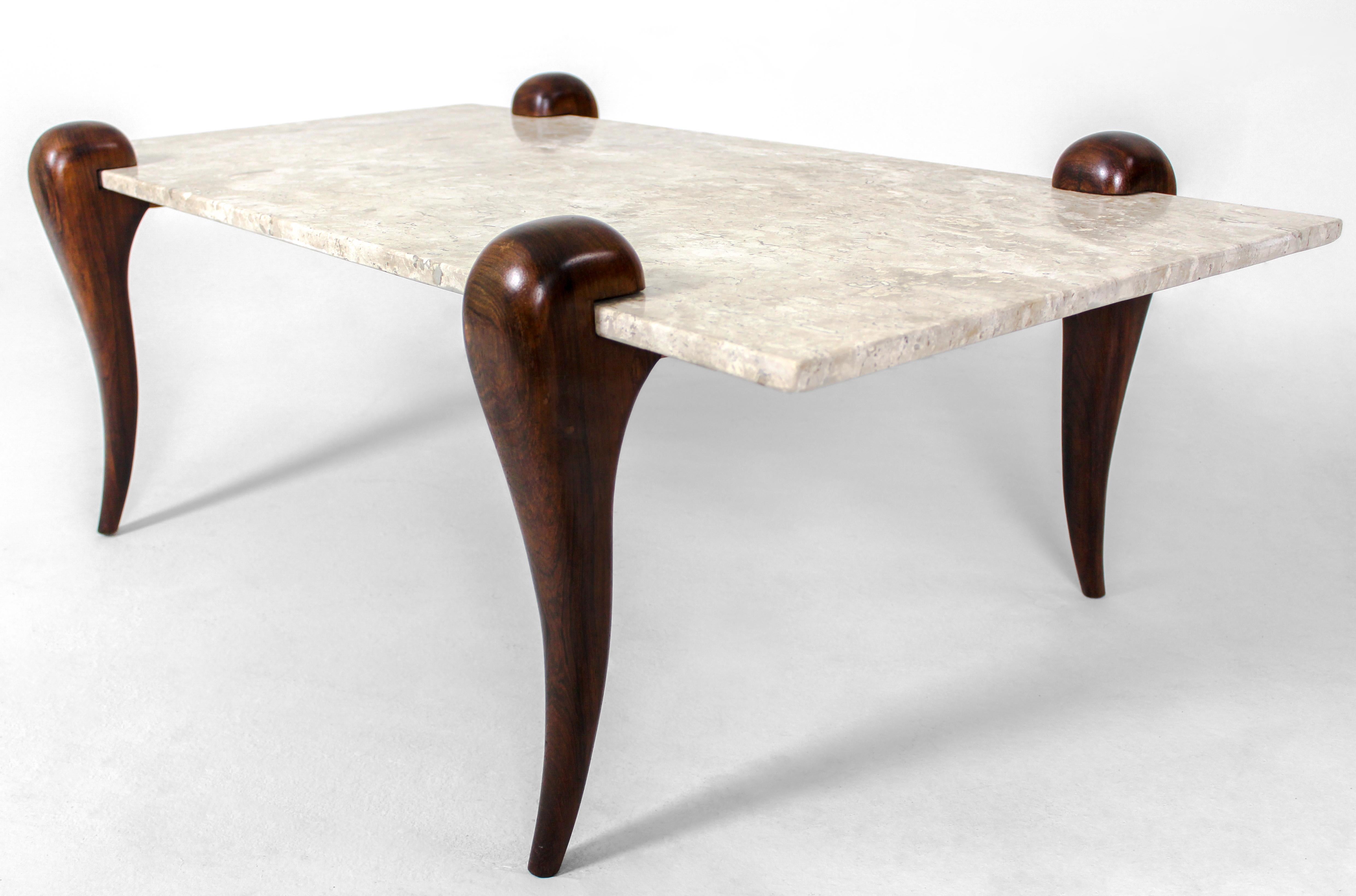 Mid-Century Modern marble-top center table, Brazil, 1950s

Brazilian center table with curvaceous wood legs and newly replaced beige Bege Bahia marble top. This piece has been finished with natural varnish maintaining the wood's character, and