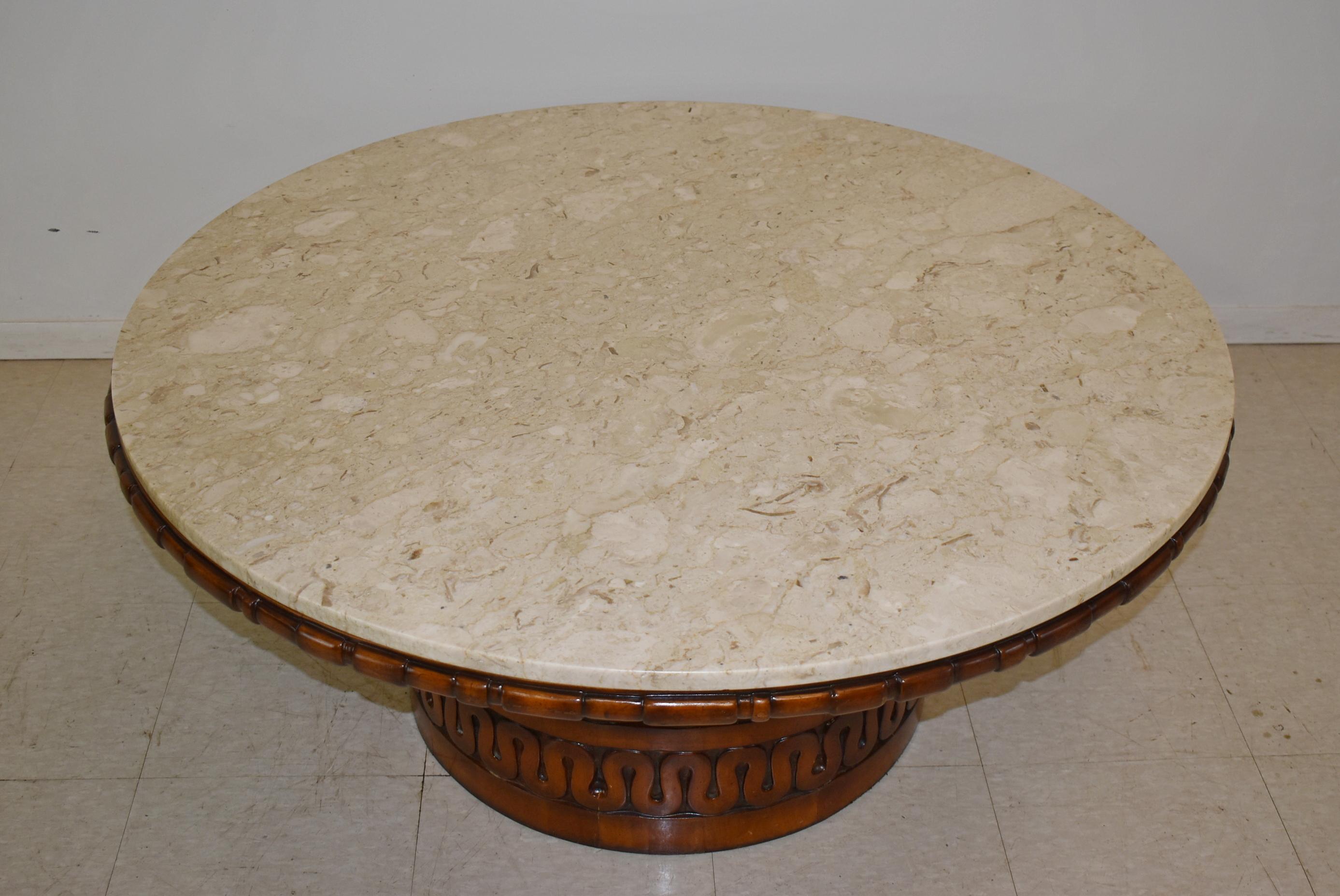 Mid-Century Modern round marble top table with carved wood base. Very nice to excellent condition. Dimensions: 40