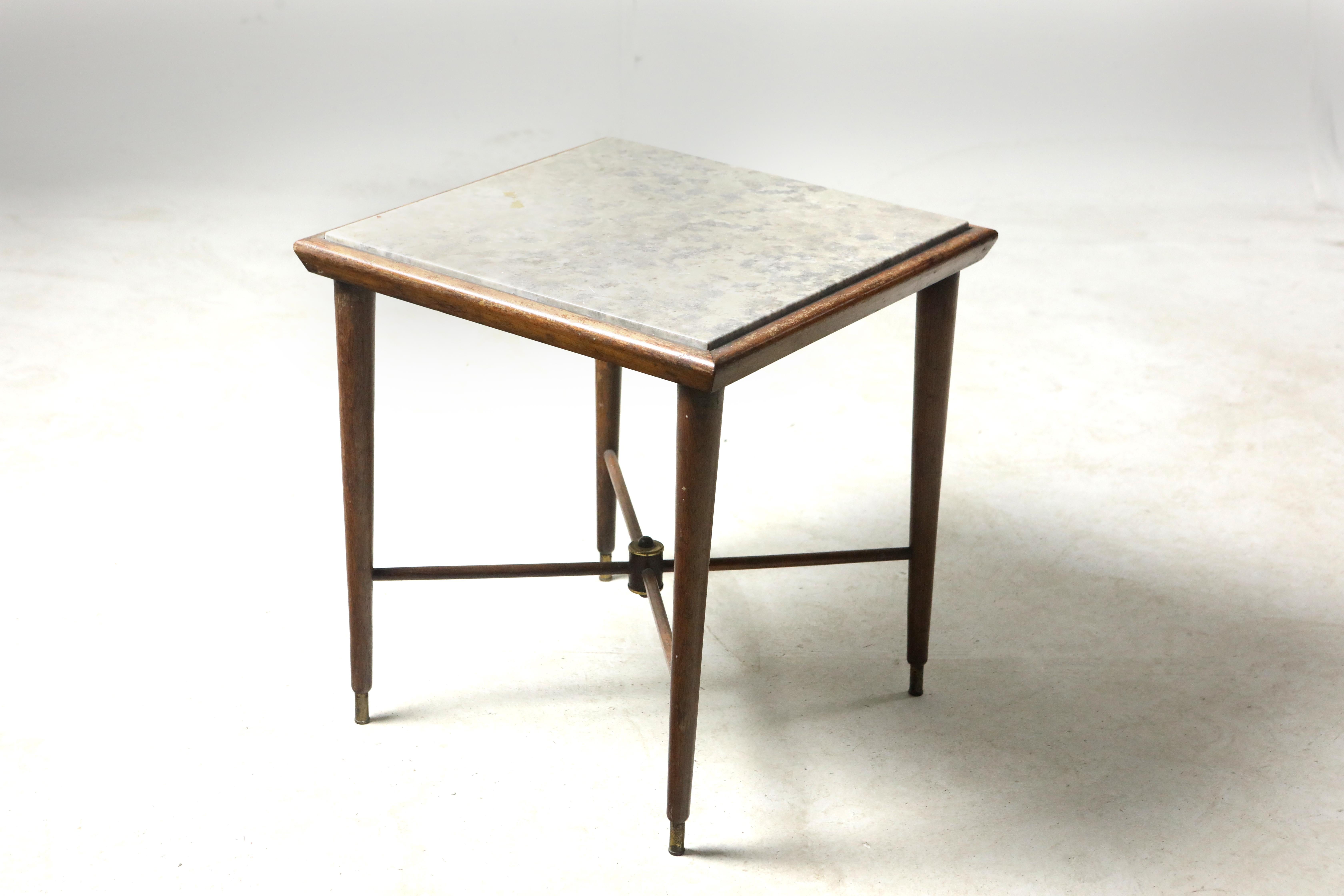 Mid-Century Modern marble-top side table by Giuseppe Scapinelli, Brazil, 1950s.

This elegant side table is a 1950s creation by Giuseppe Scapinelli. Structured in solid caviúna wood, this piece features a Brazilian marble (gray granite) tabletop