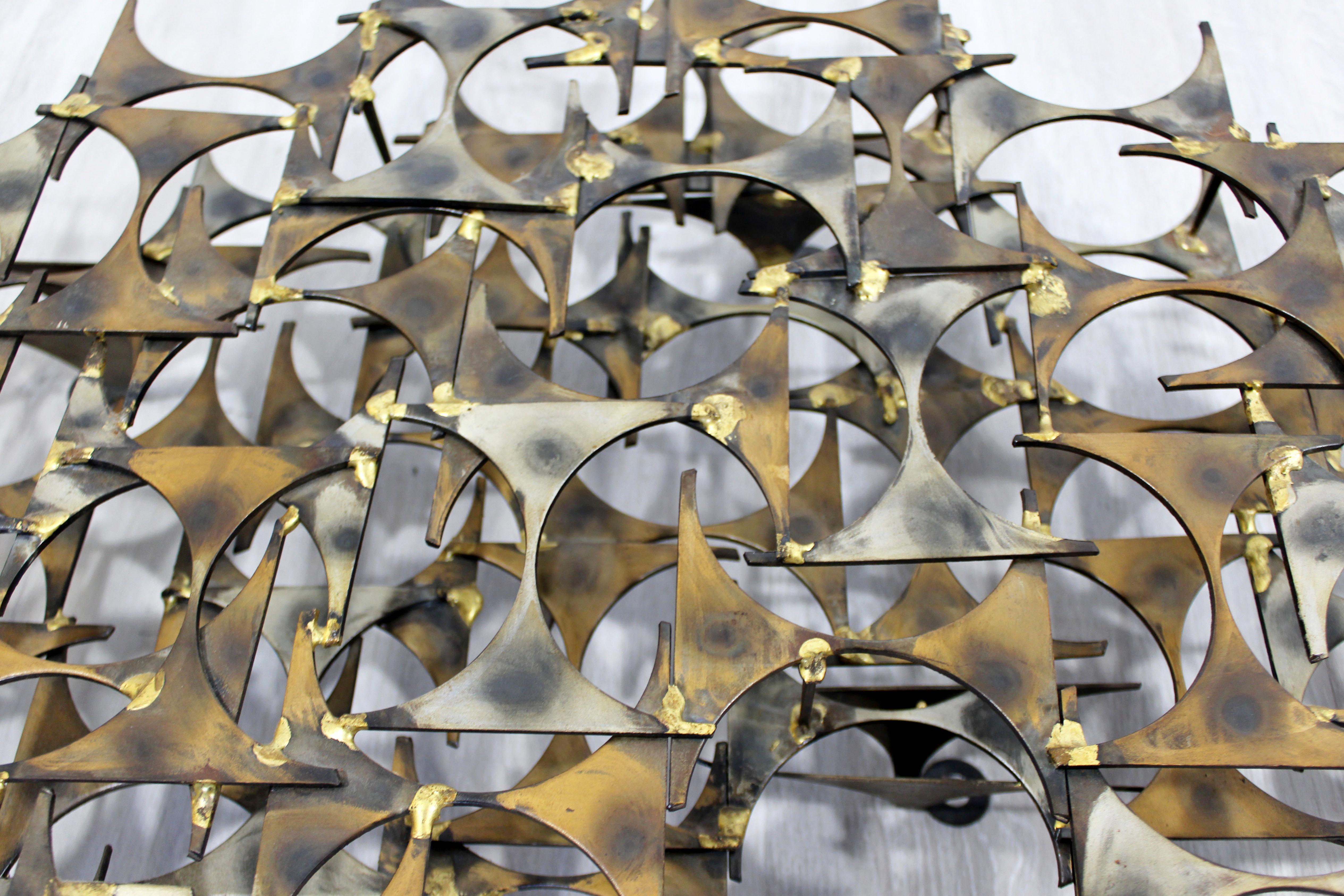 brutalist metal wall sculpture
