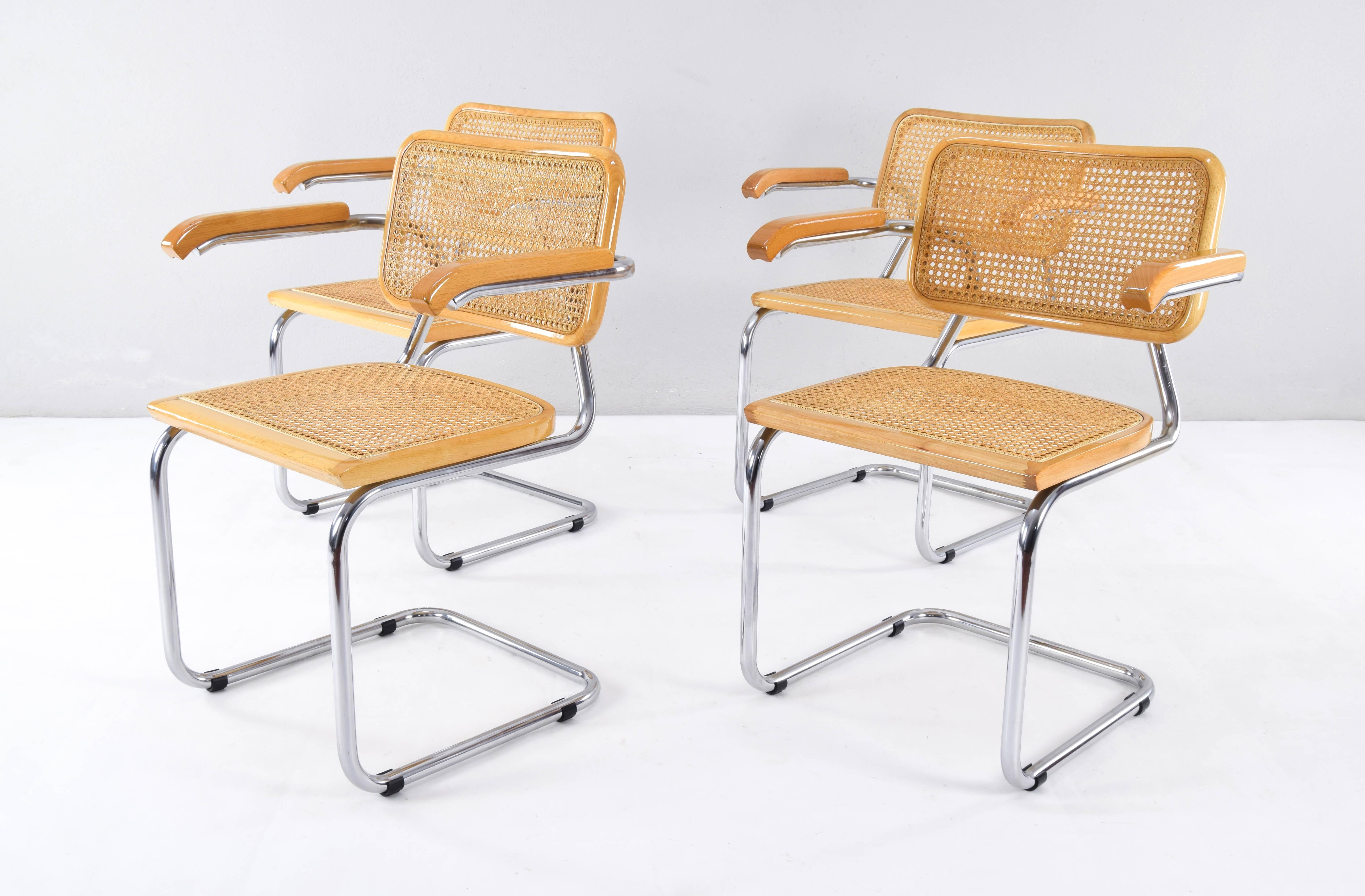 Set of four Cesca chairs model B64, made in Italy in the 1980s. Tubular structure in chromed steel, beech wood frames natural finish and Viennese natural grid.
The grids on all four seats have been replaced with new grids.

Measurements:
Total