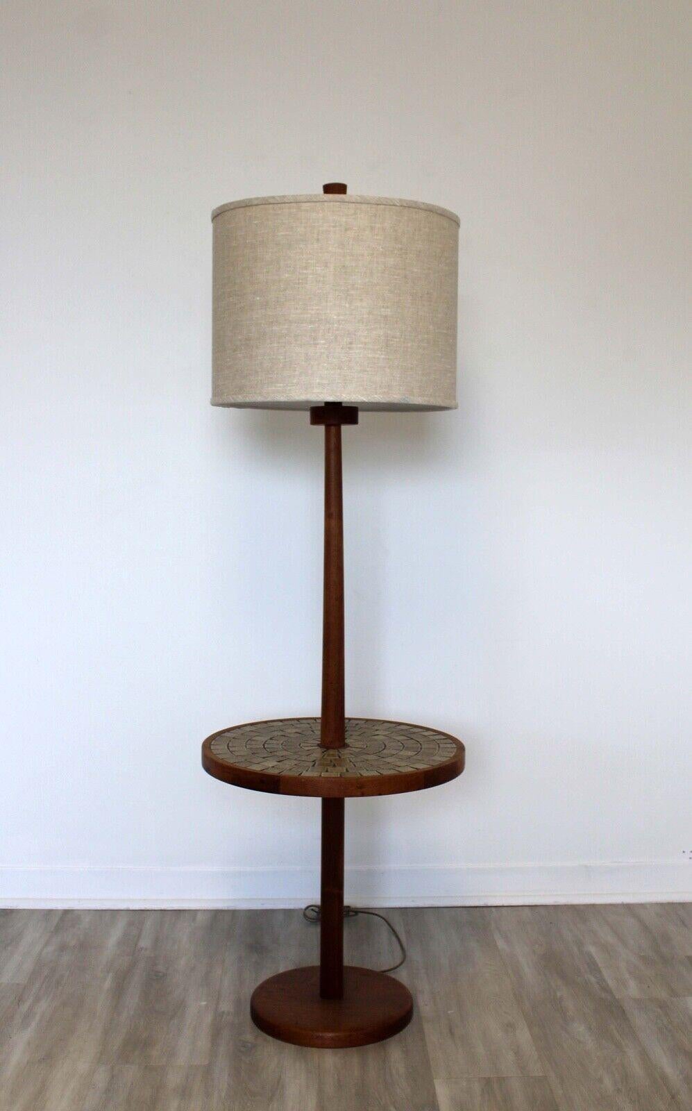 A spectacular Gordon and Jane Martz lamp w/ table up for consideration. The earthy toned tile inlaid into the walnut wood creates the perfect combination. Light turns on via twist knob. Perfect for a Mid-Century Modern house. Dimensions: 19