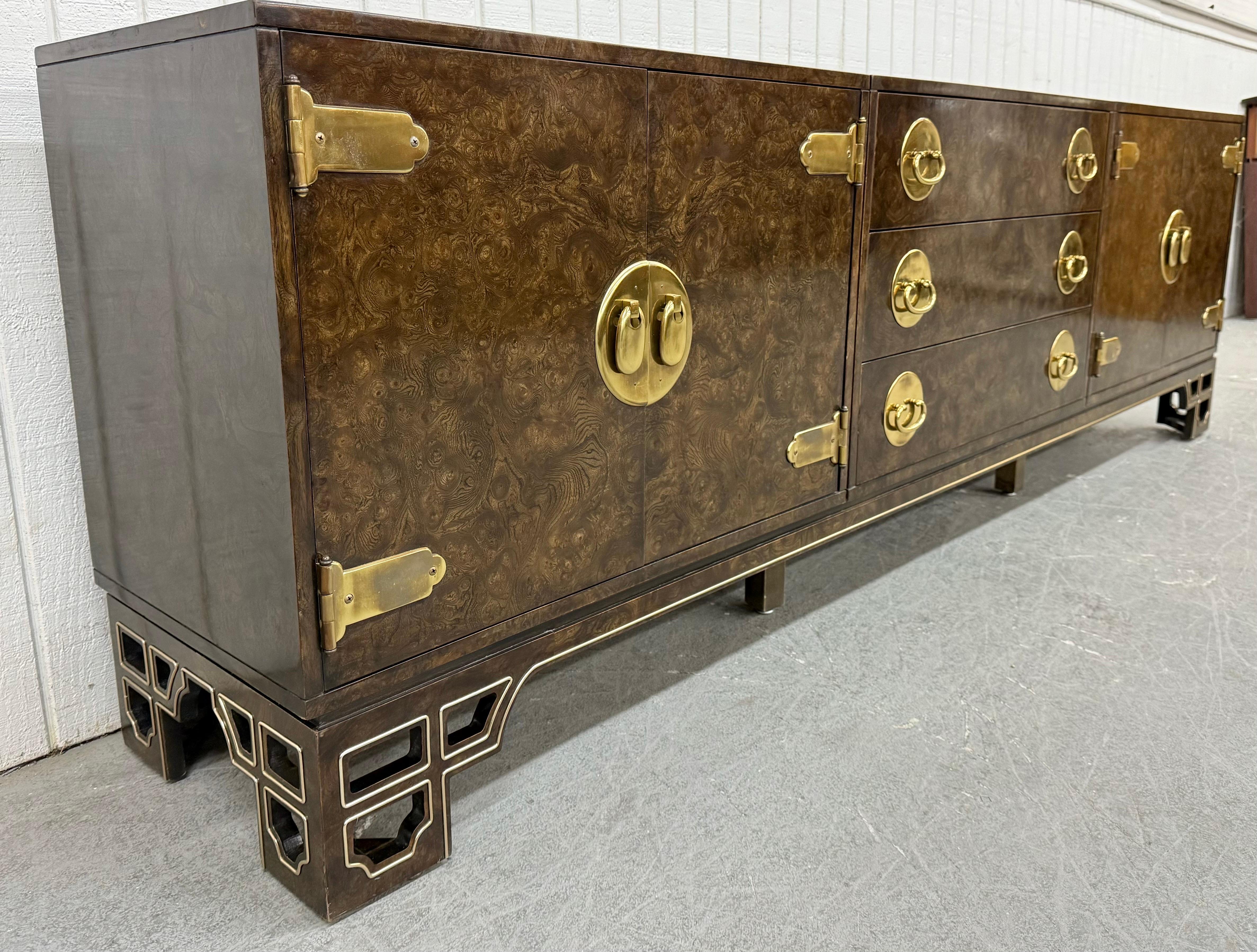 This listing is for a Mid-Century Modern Mastercraft 3-Piece Burled Wood Dresser. Featuring a straight line design, three separate pieces sitting on a modern base, doors on the left/right that open up to storage space, center drawers, original brass