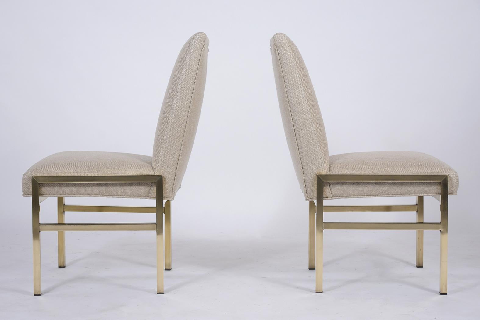 Discover the elegance of our Mastercraft mid-century modern brass side chairs, expertly restored to their original splendor. Crafted with robust brass frames that have been freshly polished, these chairs radiate a timeless charm. Newly upholstered