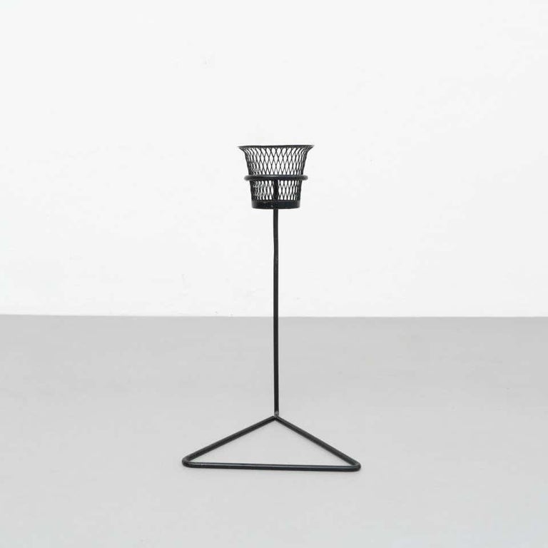 Plant stands designed by Mathieu Matégot, circa 1950.
Manufactured in France.

Perforated and lacquered metal.

Dimensions:
D 30 cm x W 32 cm x H 57 cm

In good original condition, with minor wear consistent with age and use, preserving a