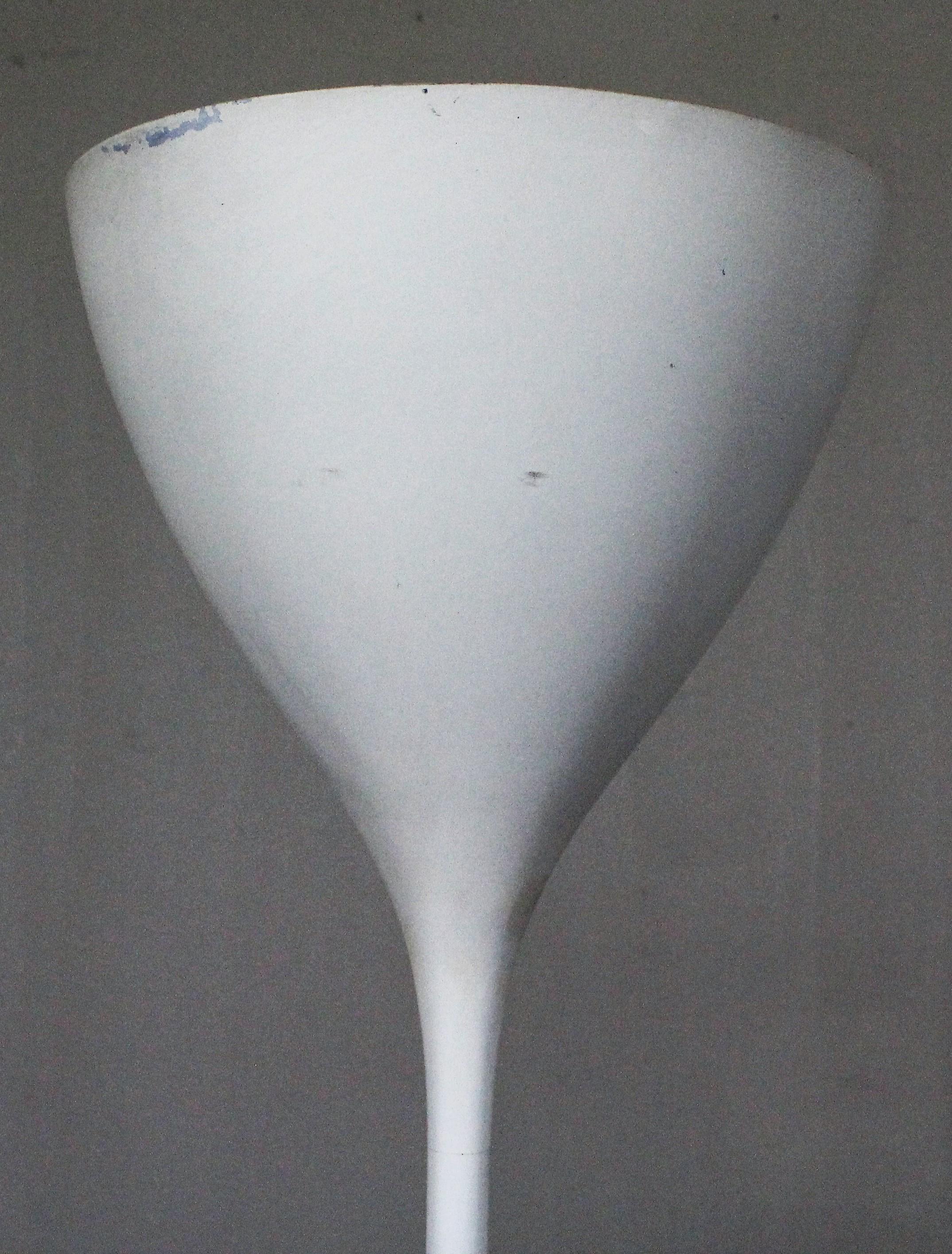 Offered is an mid-century modern torchiere lamp designed by Max Bill for B.A.G. Turgi. Features a thin stem and tulip-shaped shade covered in white enamel with a cord floor switch. It has been tested, is in good condition, showing some cosmetic wear