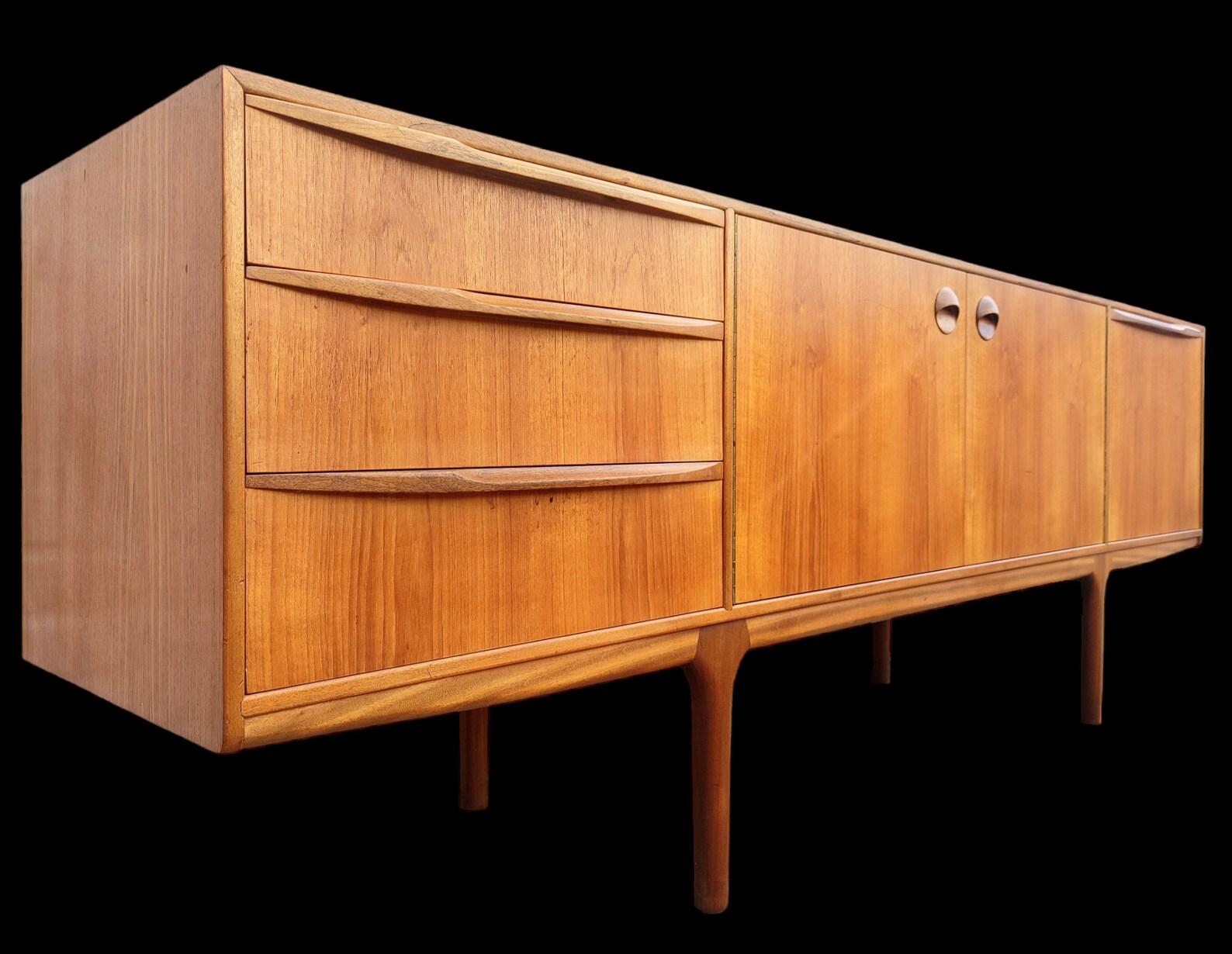 Mid Century Modern McIntosh Teak Sideboards

Above average vintage condition and structurally sound. Has some expected slight finish wear and scratching. Outdoor listing pictures might appear slightly darker or more red than the item does