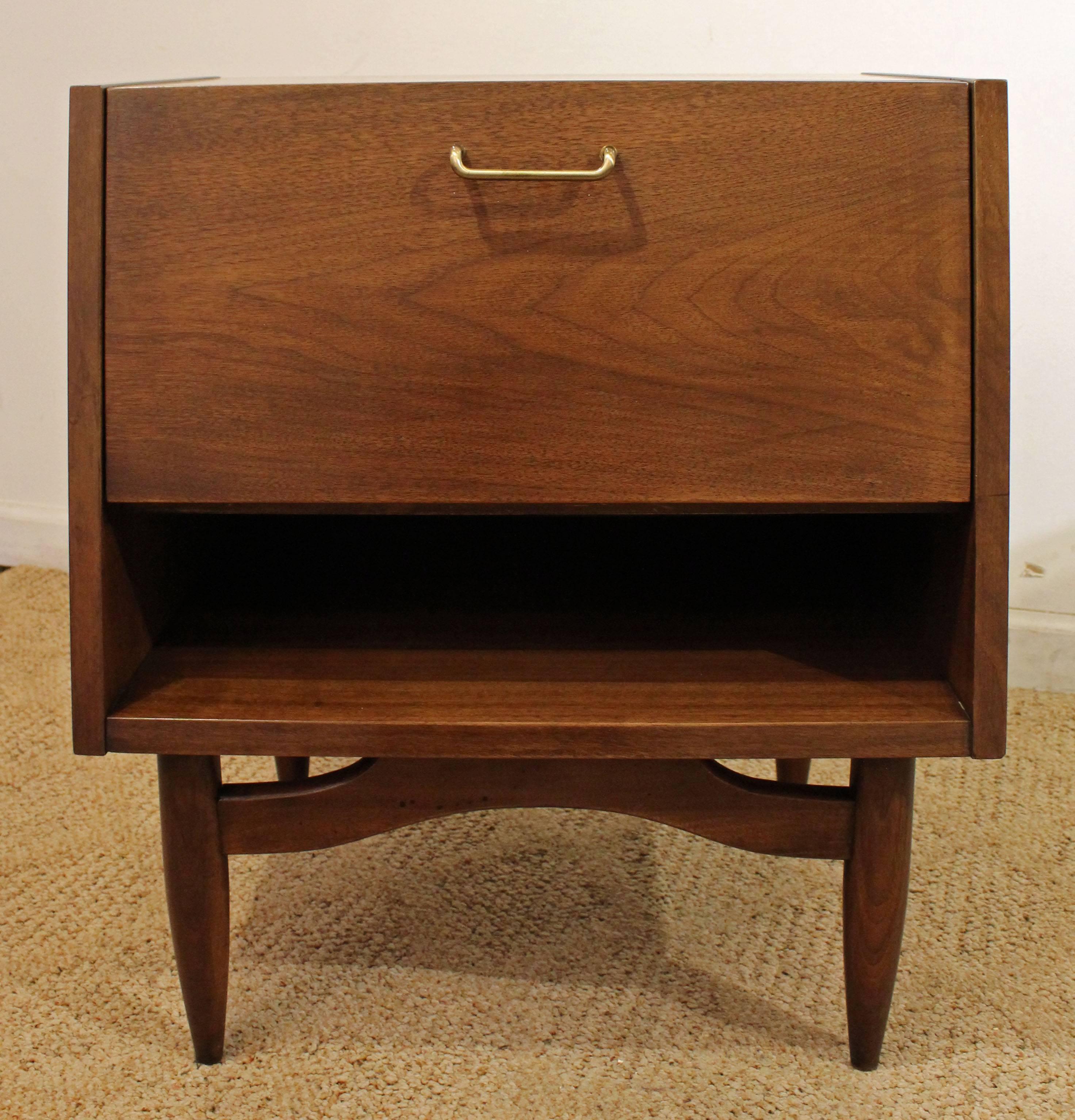 Offered is a walnut nightstand, designed by Merton L. Gershun for American of Martinsville's 