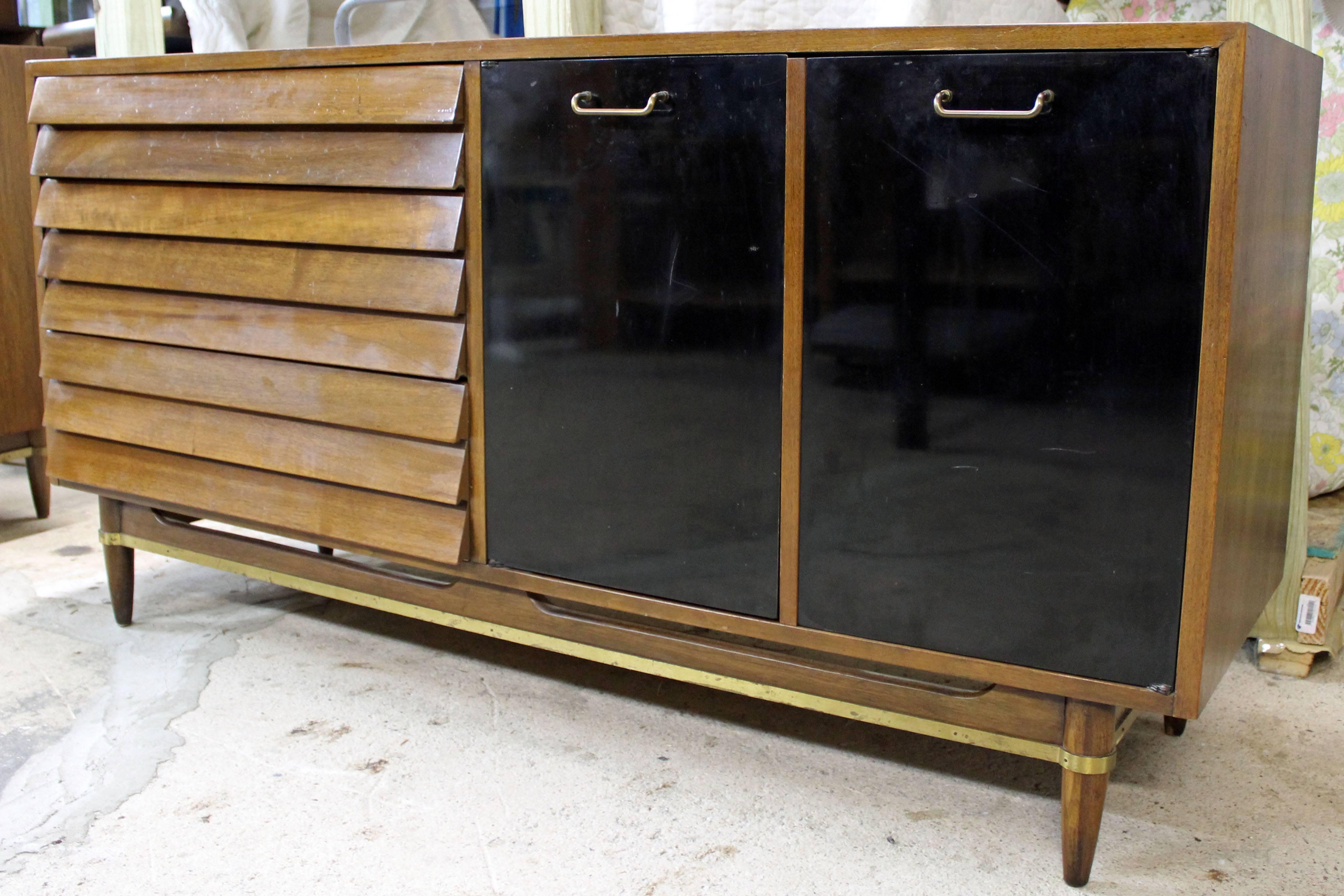 Offered is a credenza, designed by Merton L. Gershun for American of Martinsville's 