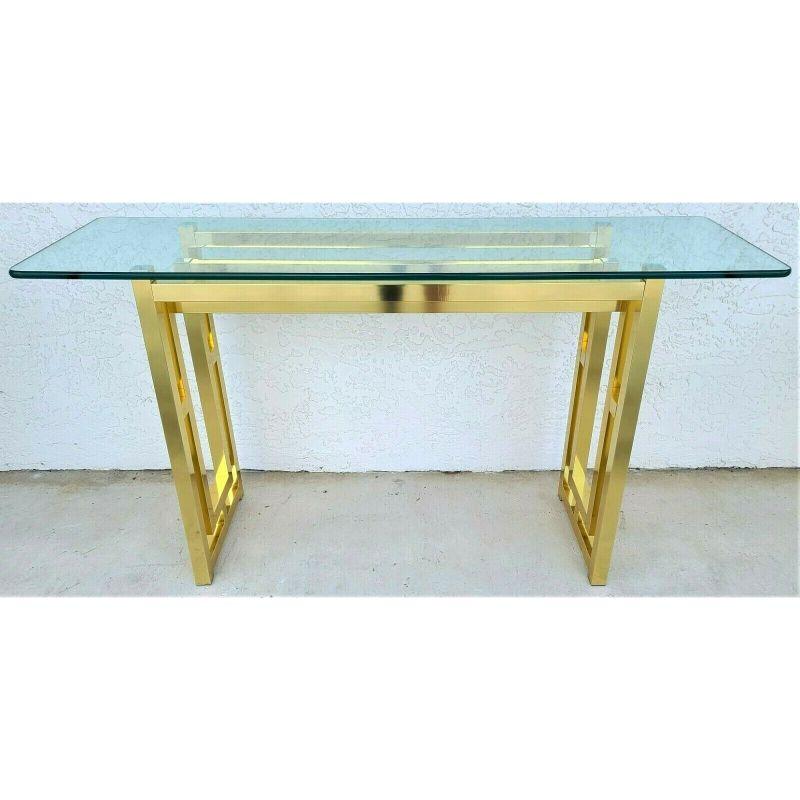 Offering One Of Our Recent Palm Beach Estate fine Furniture Acquisitions Of A 
Mid-Century Modern Metal and Glass Console Table With Chrome Caps supporting the glass.

Approximate Measurements in Inches
27.75