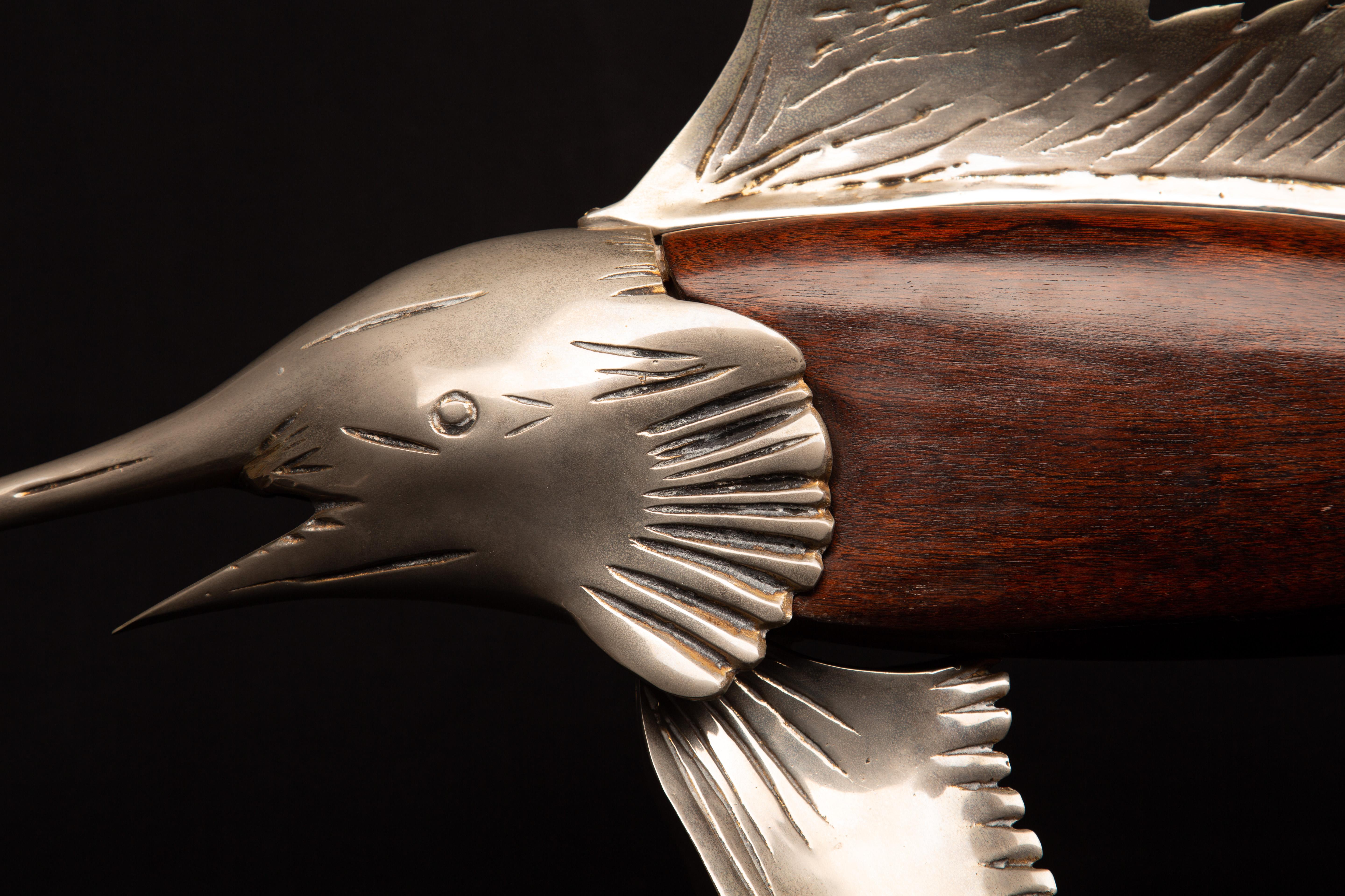 Mid-Century Modern metal and wood swordfish:

Measures: 36