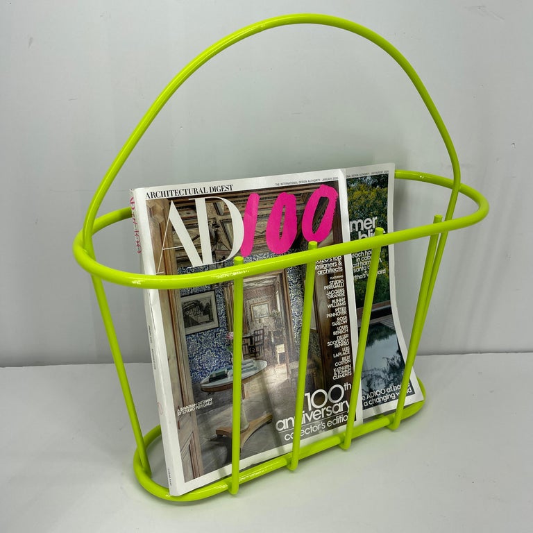 Magazine rack looking bold and fun in freshly powder coated chartreuse. Just look at this fun piece in all it's glory! Functional and bright, this magazine rack will be a wonderful addition to your already hip decor!