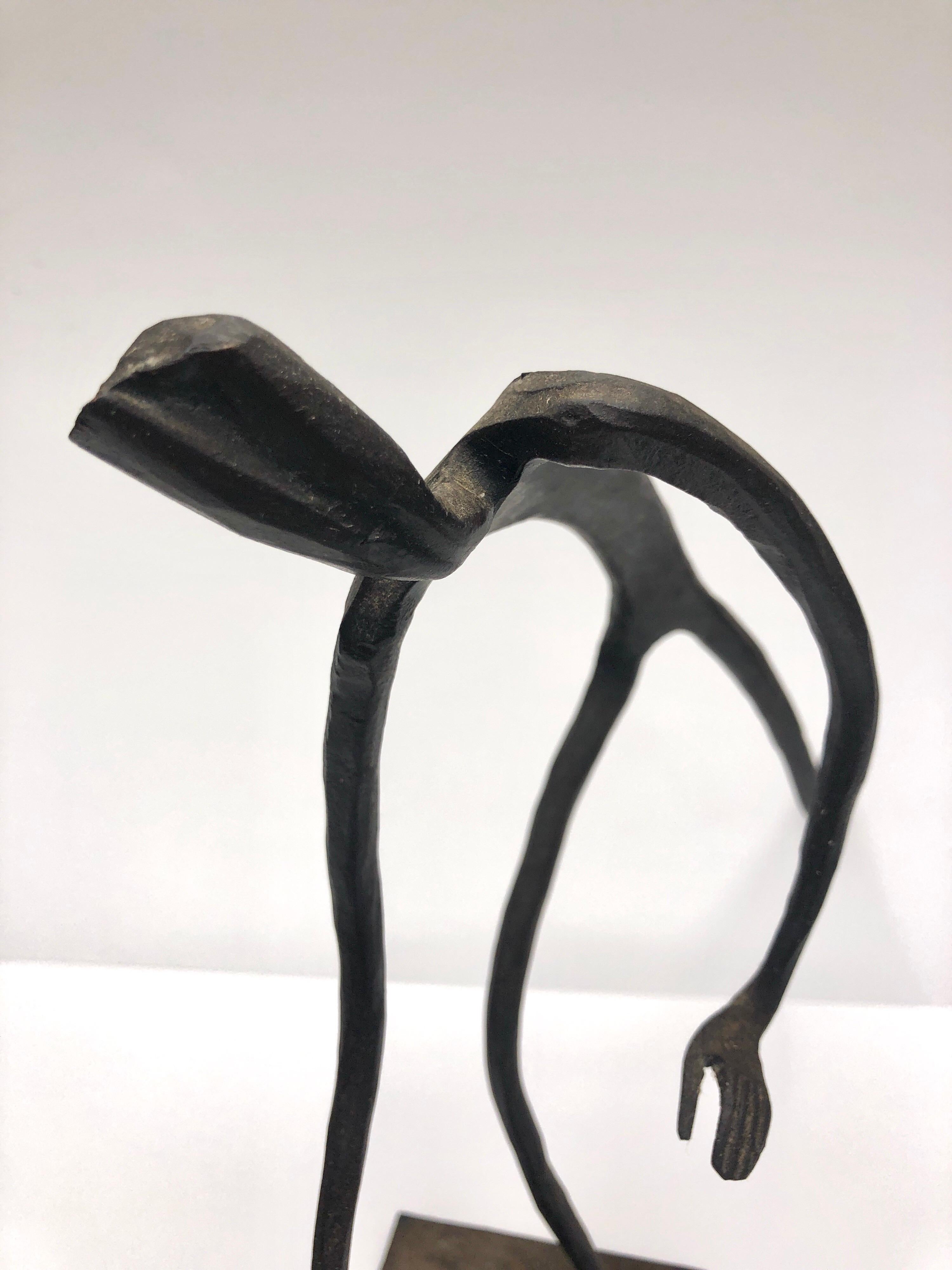 Mid-Century Modern Metal Sculpture of Man with Ring 1