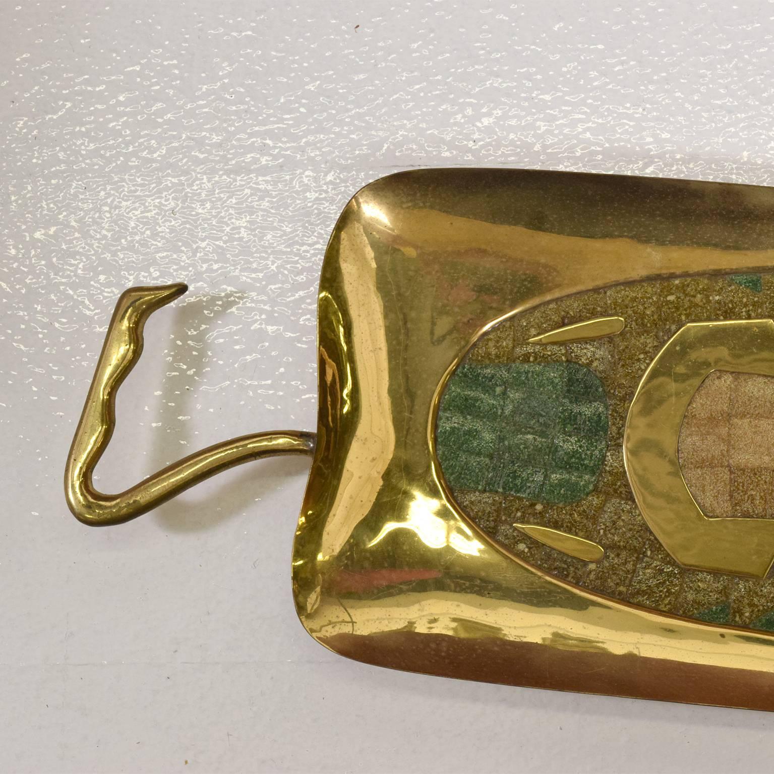 For your consideration a vintage dish in brass and inlay tile decoration by Salvador Teran.
Dimensions: 23 1/4