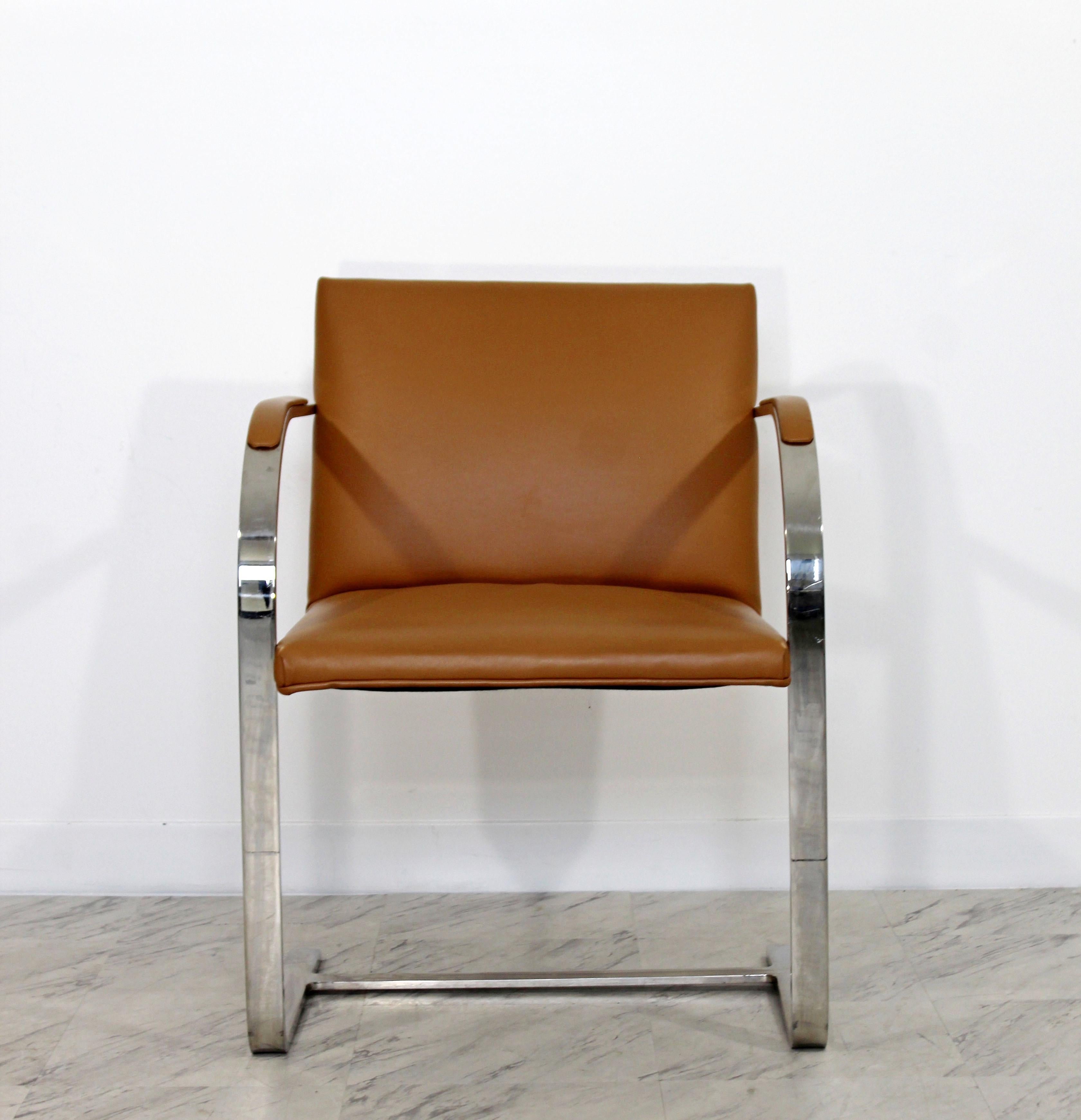 For your consideration is a phenomenal, single, cantilever, flat bar chrome armchair, in the style of Mies Van der Rohe for BRNO, circa the 1970s. In excellent condition. The dimensions are 22.5