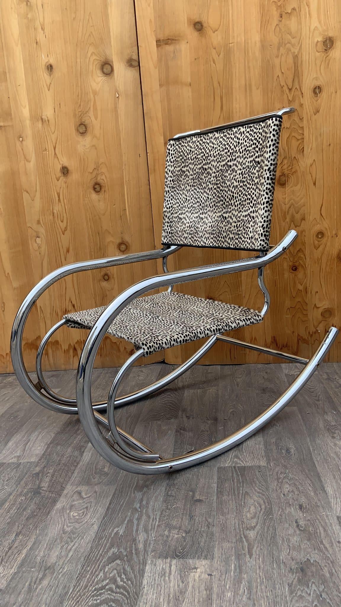 Mid Century Modern Mies Van Der Rohe Style Fasem Bauhaus Chrome Sling Rocker Newly Upholstered in Cheetah Print Hair-on Cowhide

The Mid Century Modern Mies Van Der Rohe Style Fasem Bauhaus Chrome Sling Rocker, newly upholstered in Cheetah Print