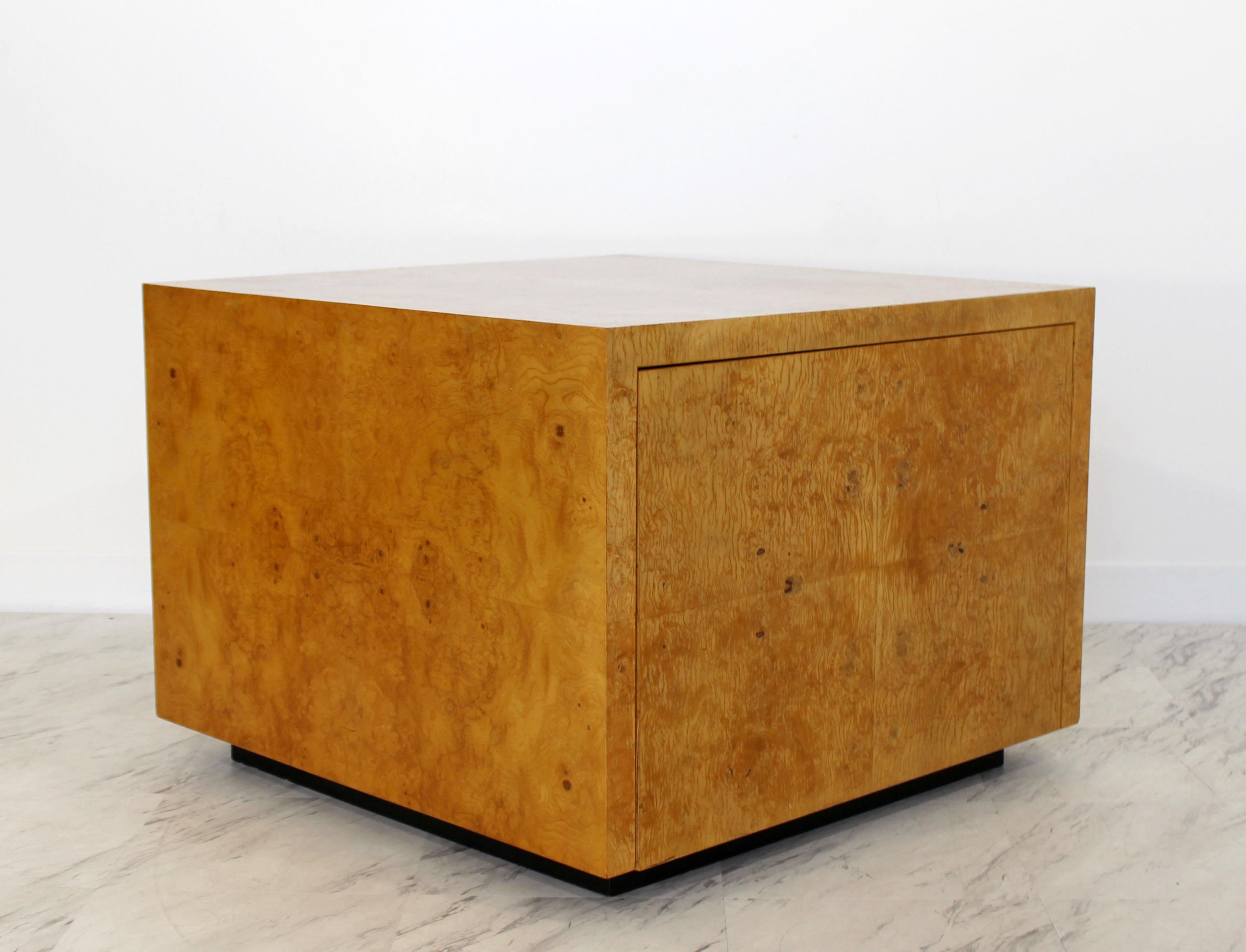 For your consideration is a fantastic, square, burl wood side table, with a push-in door and one shelf, by Milo Baughman, circa the 1970s. Can also be used as a coffee table. In very good condition. The dimensions are 30