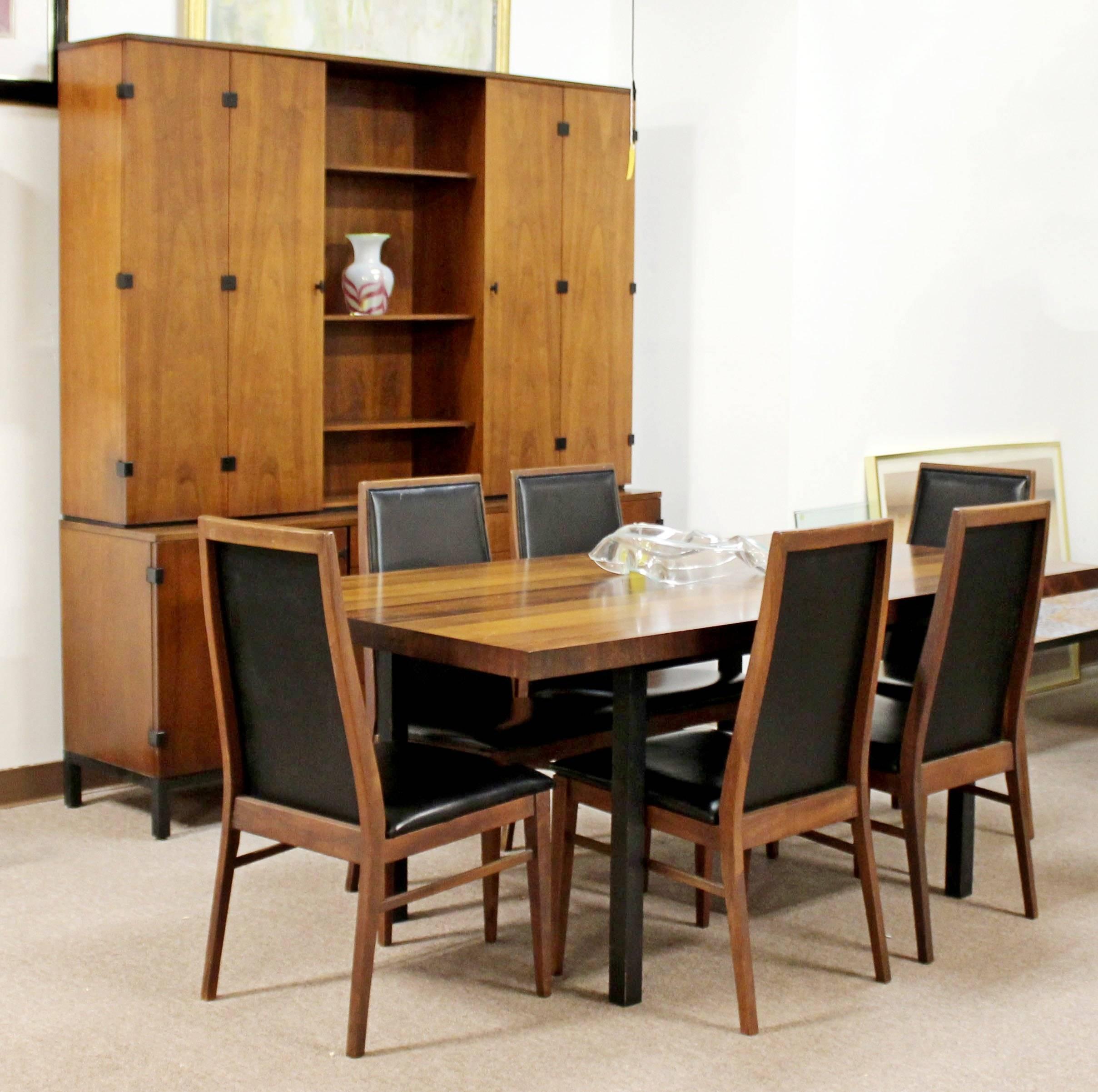 For your consideration is a magnificent dining set, including table by Milo Baughman for Directional with rosewood, walnut and ash, and six side chairs, by Milo Baughman for Dillingham, circa 1960s. In great vintage condition. The dimensions of the