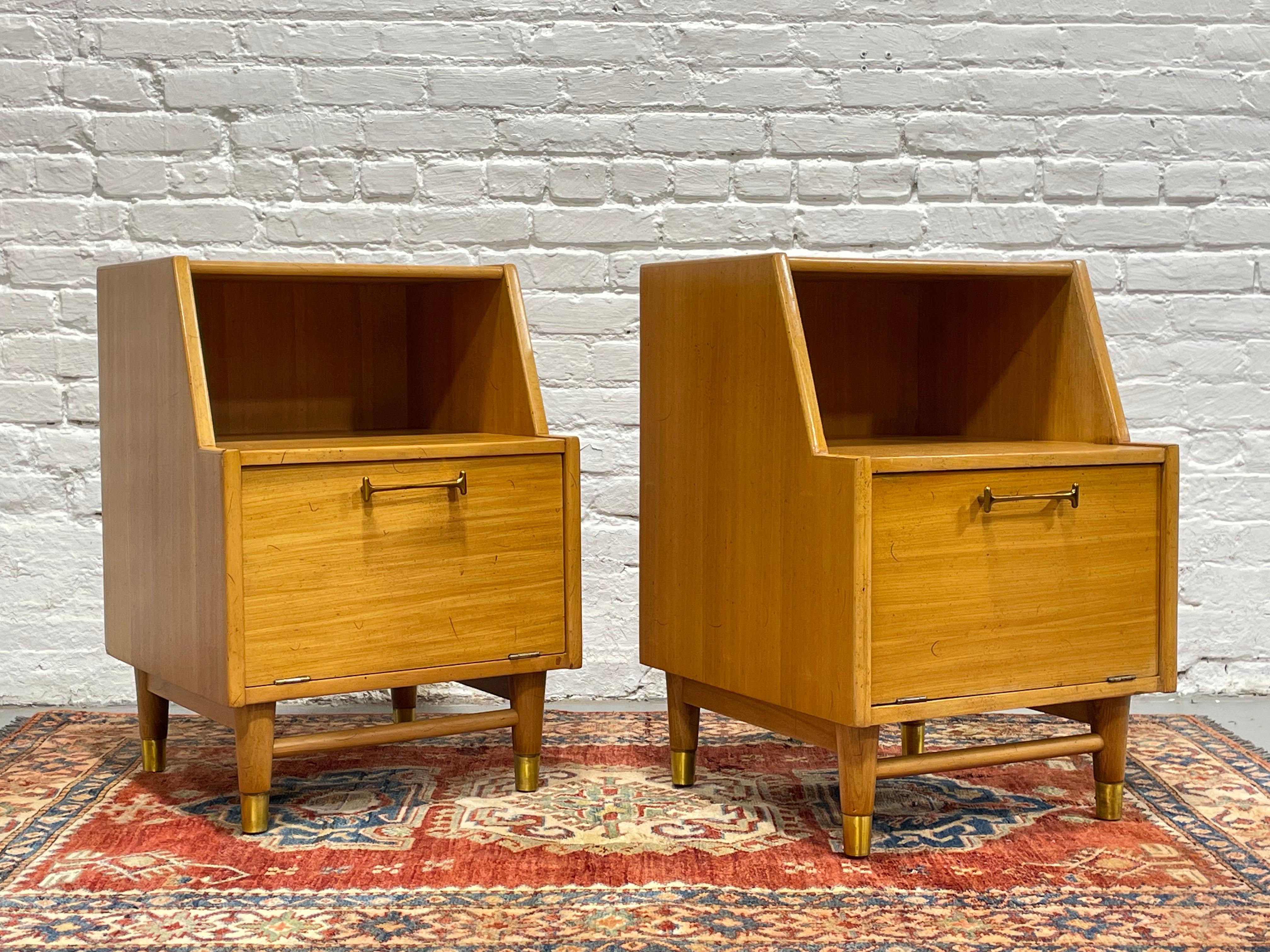 Mid Century Modern Nightstands, designed by Milo Baughman for Drexel, c. 1950’s.  Sleek and minimalist design in a maple finish with angled profile. Loads of storage space for all your bedtime essentials - large hidden cabinet space behind the drop