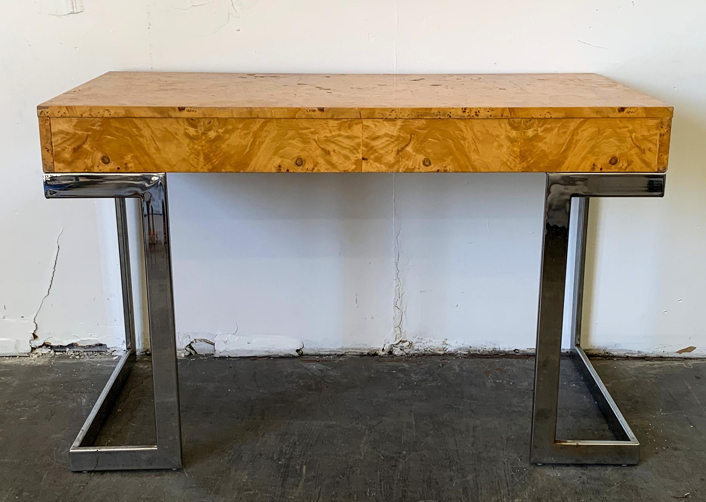 Available right now I have this stunning Arthur Umanoff burl desk for Contemporary Shells, circa 1978. The desk features 2 drawers and a gorgeous chrome frame. This smaller desk features a little more storage than a traditional writing desk and