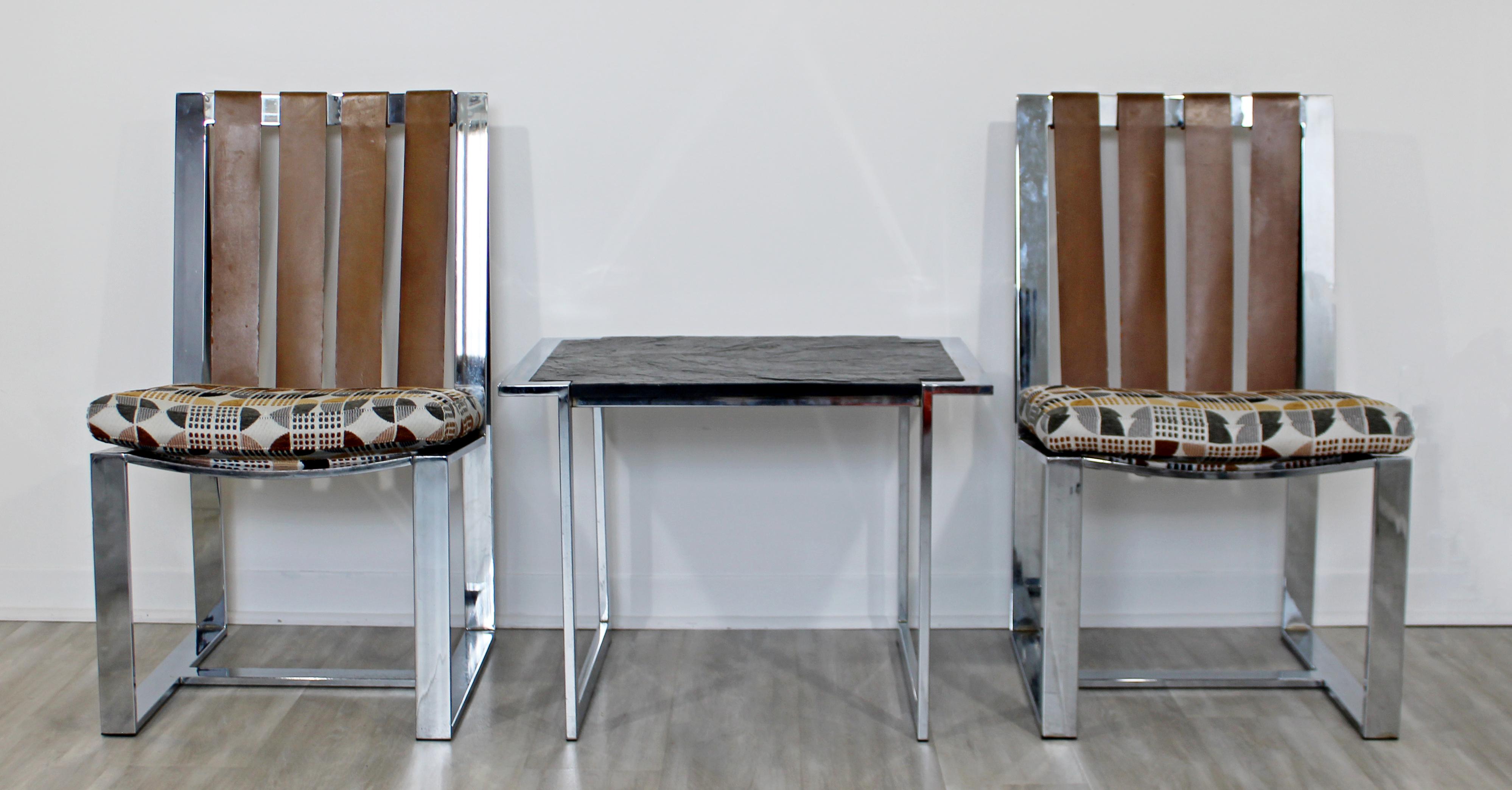 For your consideration is a fantastic pair of chrome and leather lounge chairs, with a matching slate side table, by Milo Baughman for Thayer Coggin, circa 1970s. Chairs just came back from being professionally reupholstered. In very good condition.