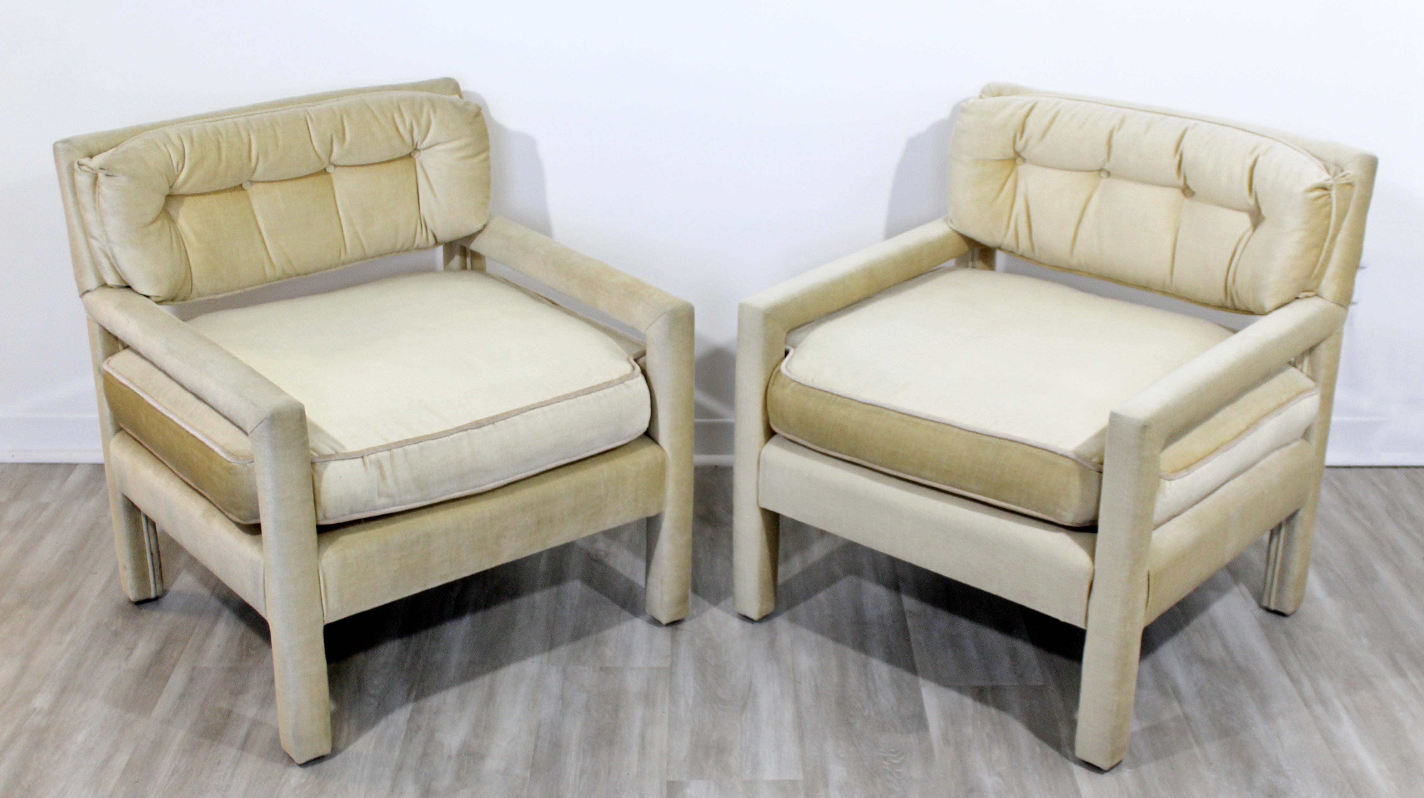 For your consideration is a pair of large, plush armchairs, in a velvet fabric, attributed to Milo Baughman for Parsons, circa 1970s. In excellent condition. Due to the lighting they look discolored but they are in excellent condition and are cream