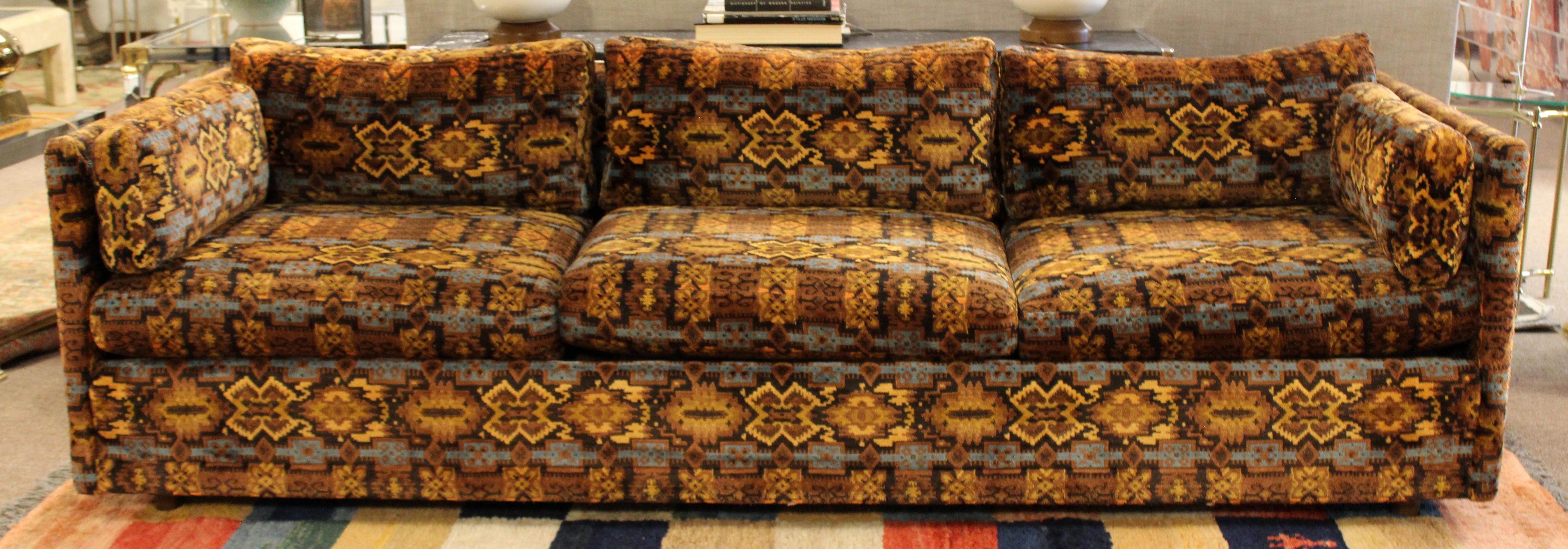 For your consideration is a spectacular sofa, by Milo Baughman, with Jack Lenor Larsen style fabric, circa 1960s. In excellent vintage condition. The dimensions are 91